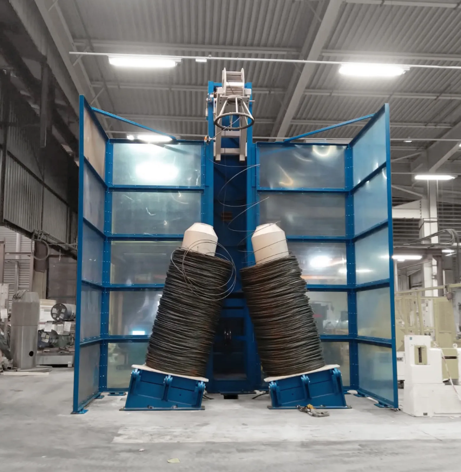 Overhead pay-off VA-G1, suitable up to 16.0 mm wire diameter, optionally with one or two tilting cones, these optionally in hydraulically tilting and/or driven design.