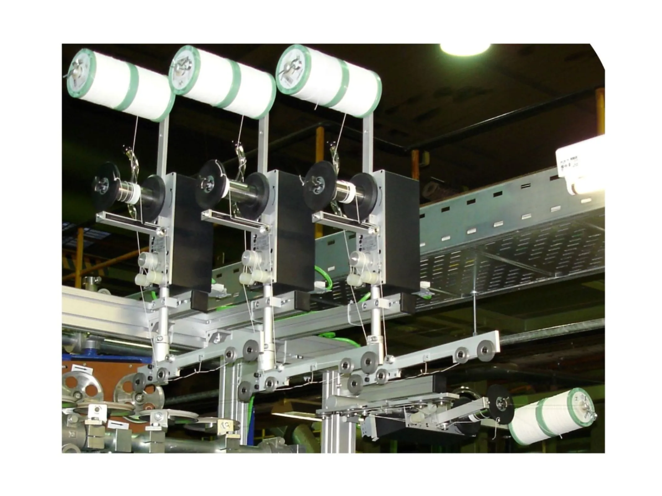 HELILUB® applicators NB52 operated in an industrial multi line enamelling machine