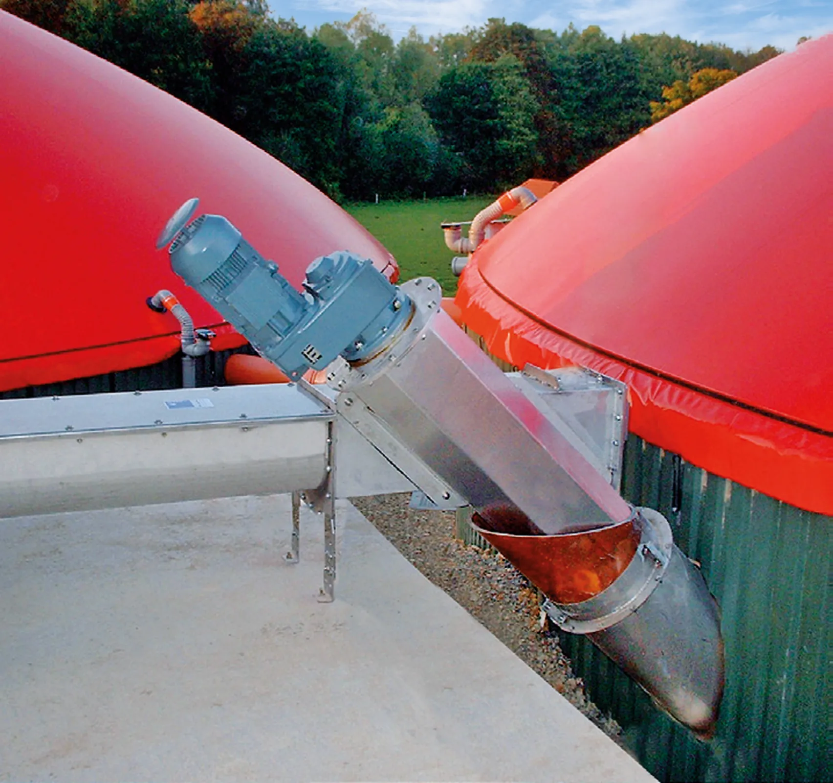 Feeding a digester ebedded in the ground