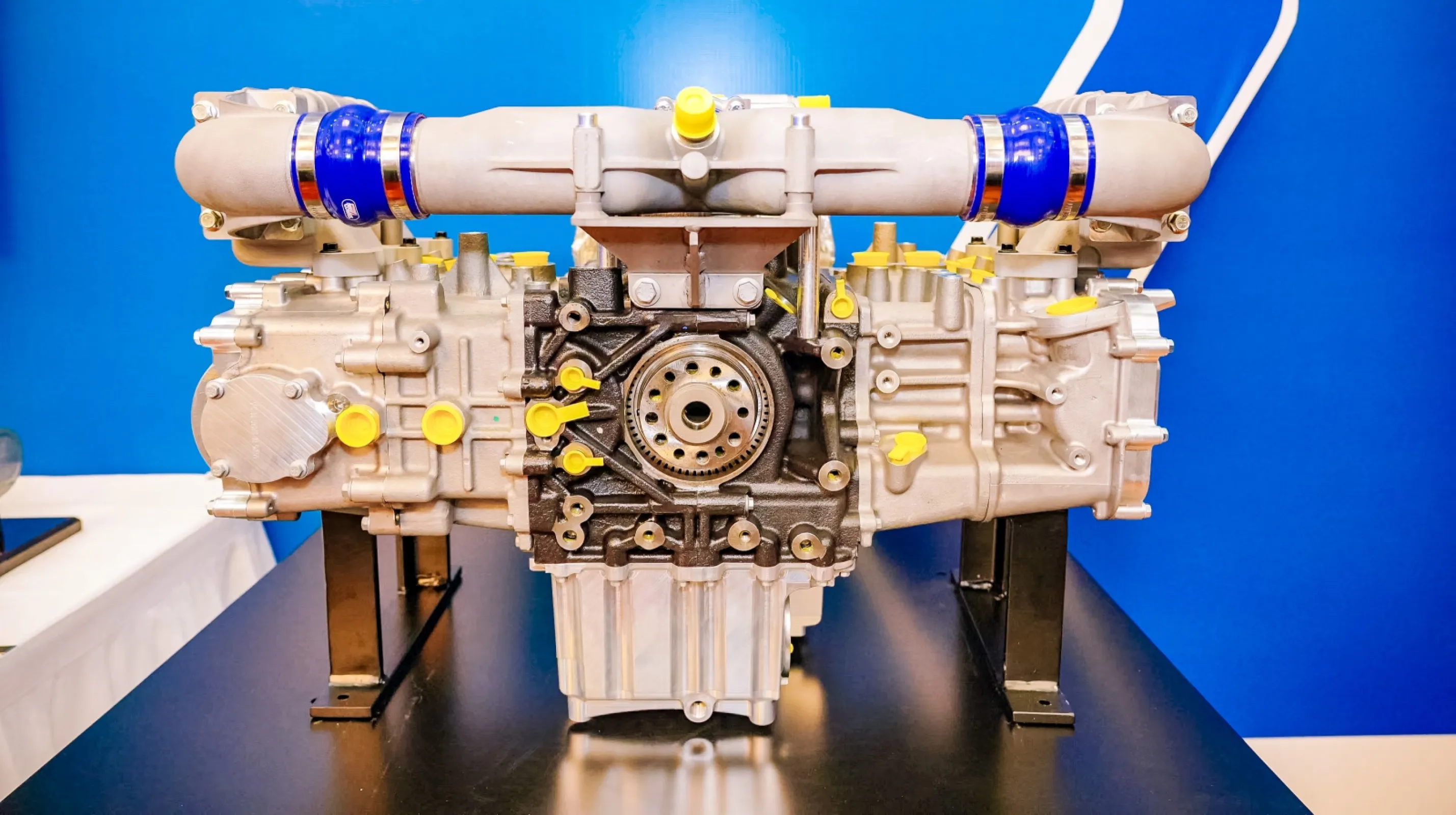 Mirror image opposed yoke drive engine