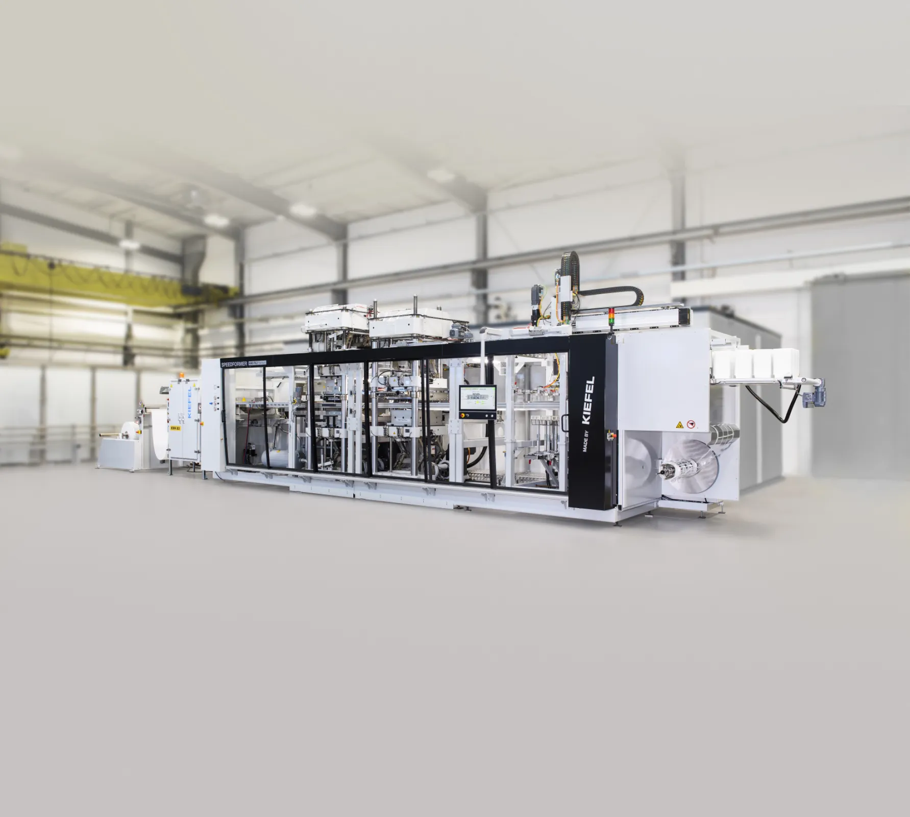 Thermoforming machines for trays, lids, other packaging