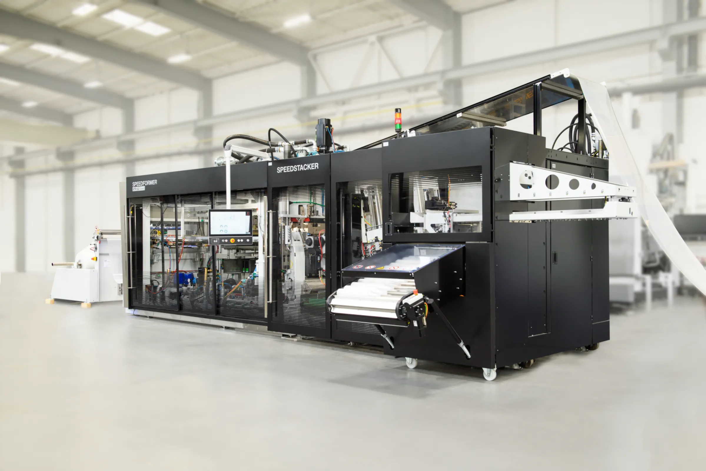 Thermoforming machines for high-end cups