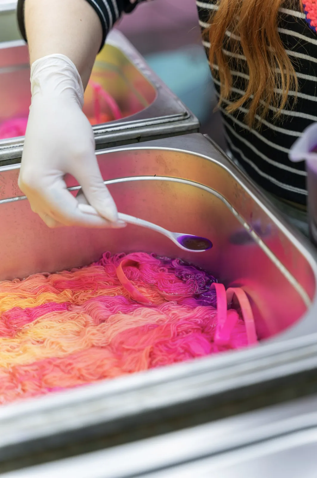 Dye is being applied to the yarn