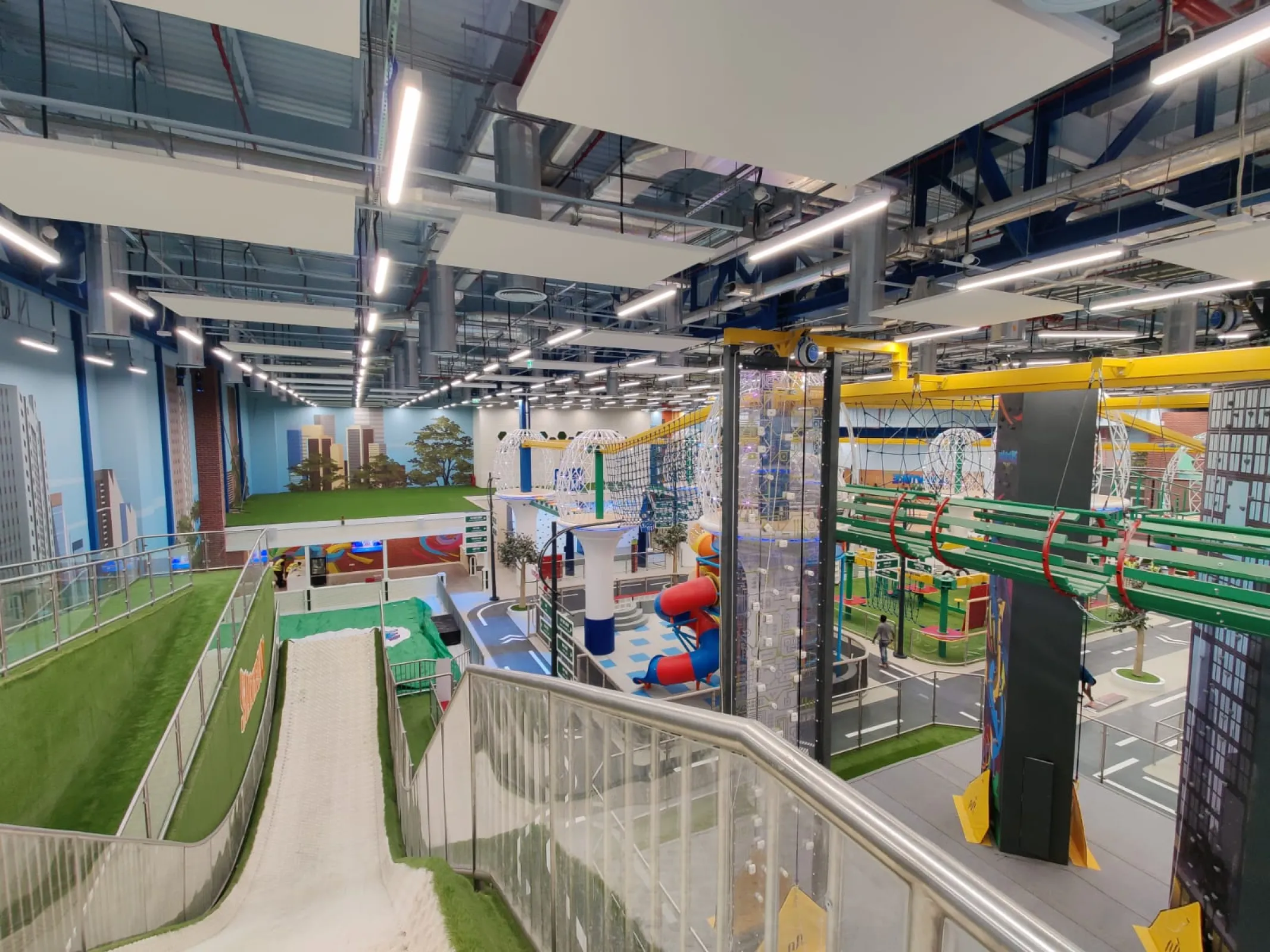 Dubai Hills Mall - Kids play center with extraordinary tubing track with jump into an air bag.