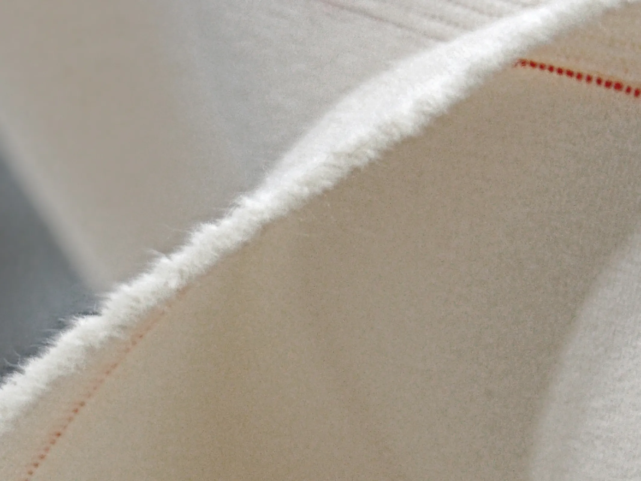 Our trademark: the red thread