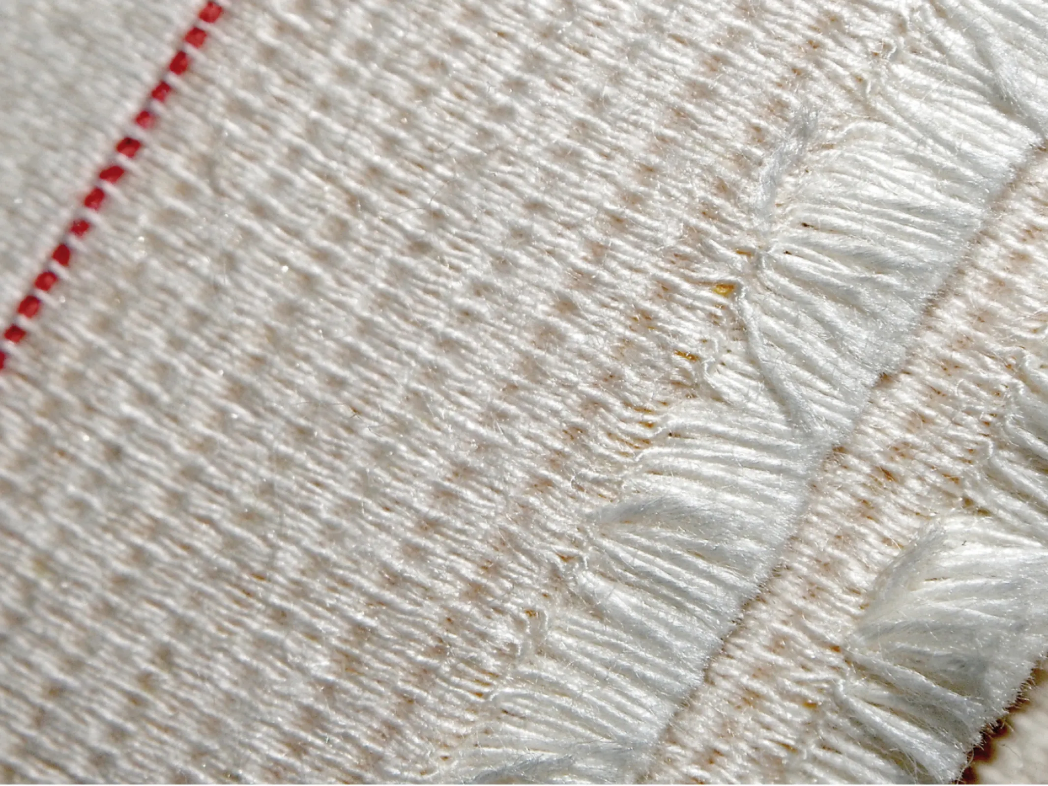 Our trademark: the red thread