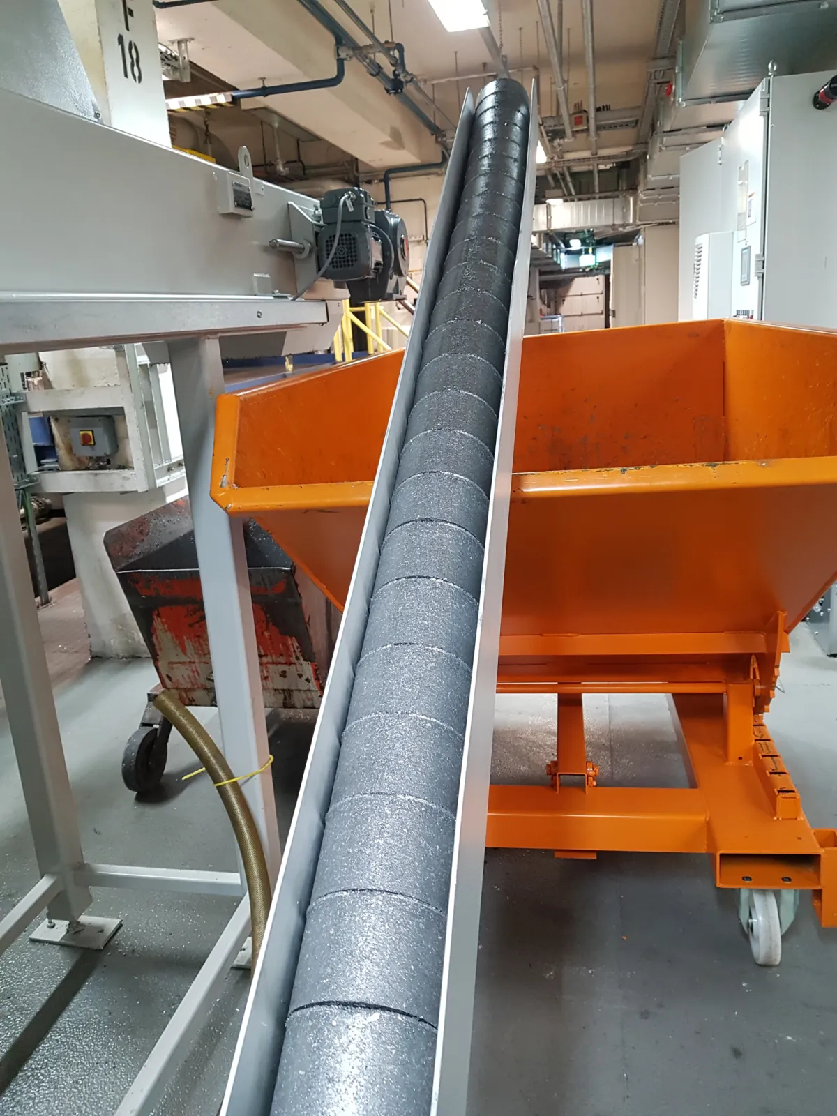 Briquettes after the briquetting process in the discharge of the press