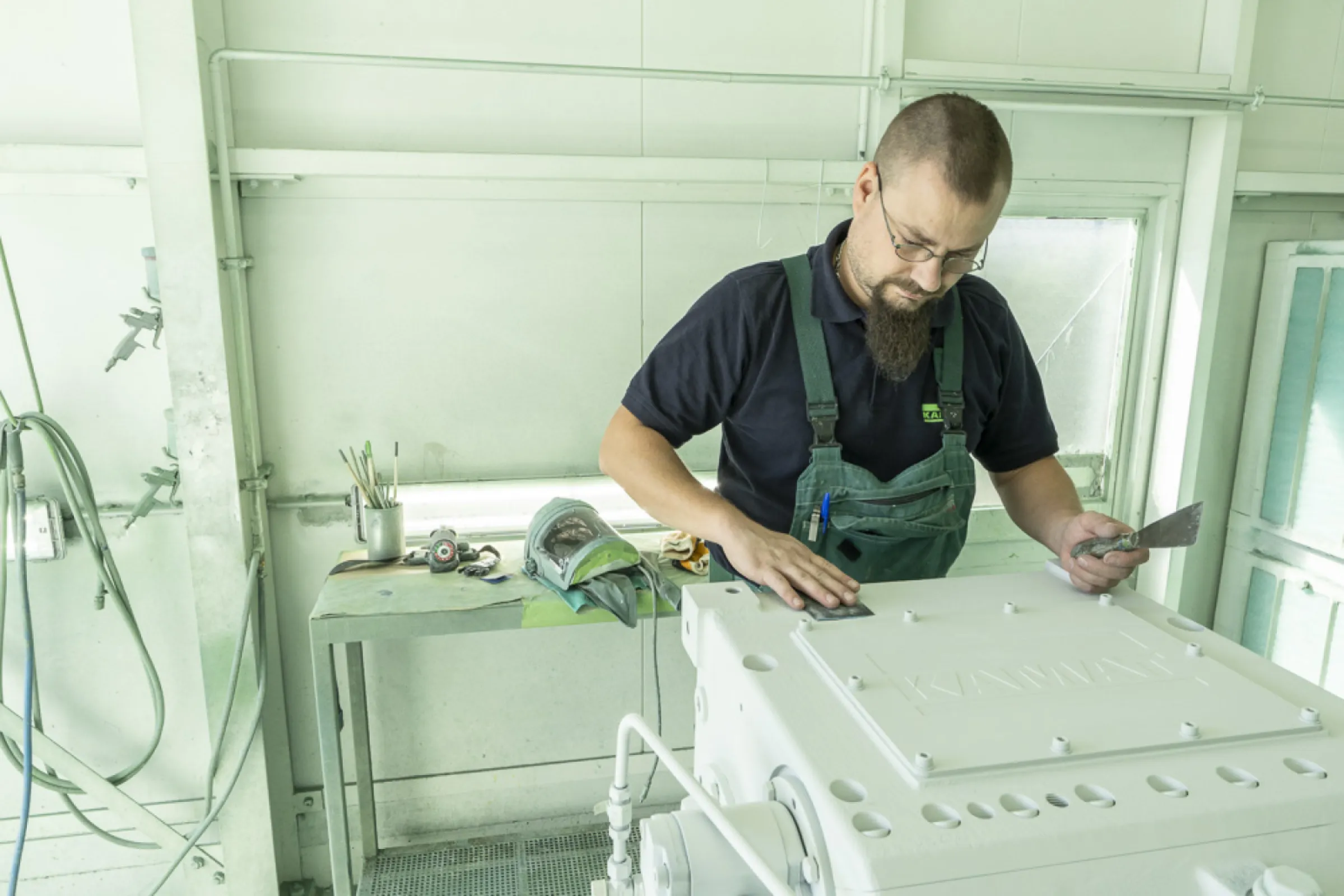 Finishing with care – our painter applies high-quality coatings for durability and corrosion protection.