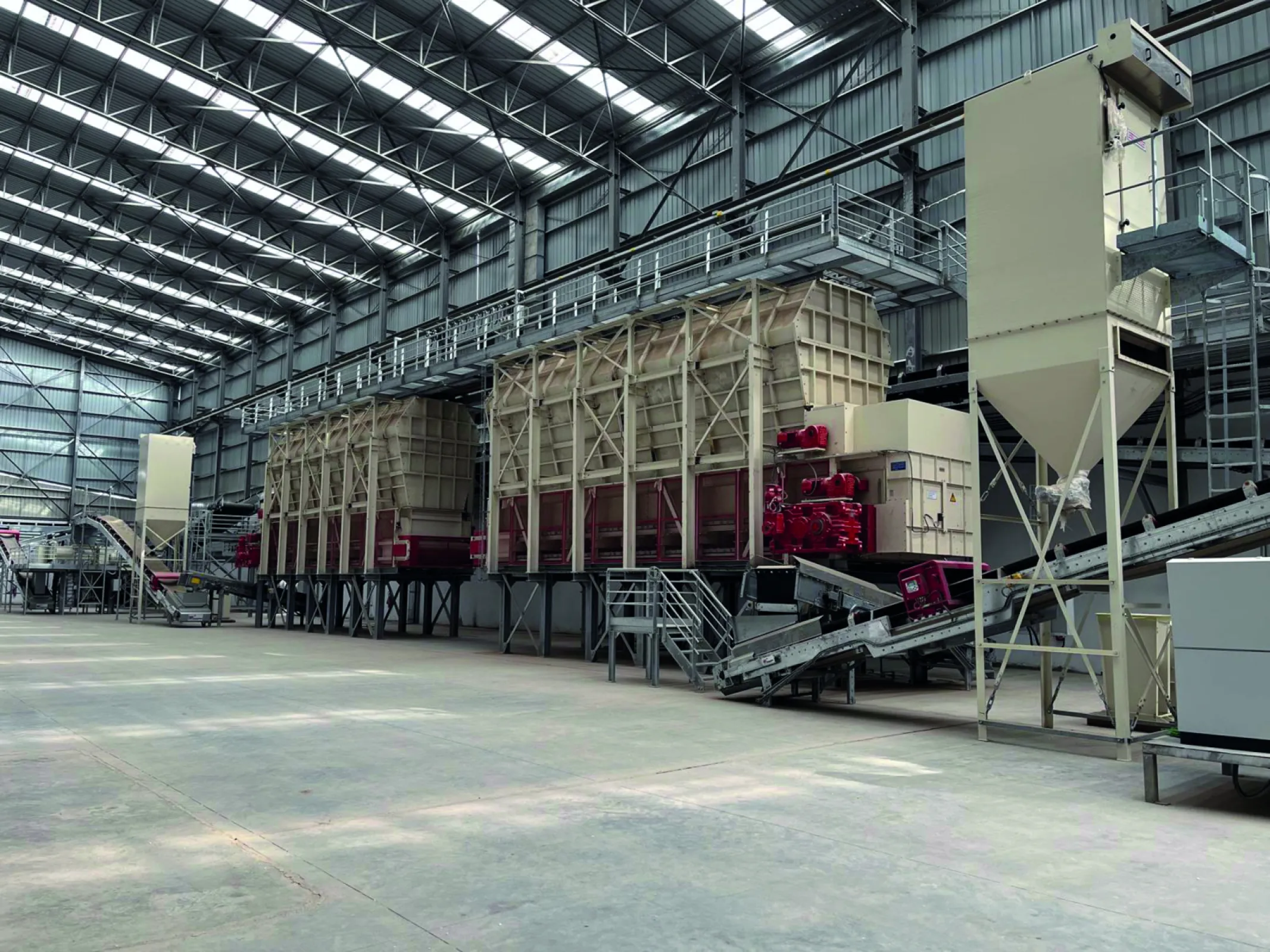 HAENDLE Box Feeder for feeding, proportioning, buffering and storing of unprocessed raw materials, prepared bodies, additives and waste materials.