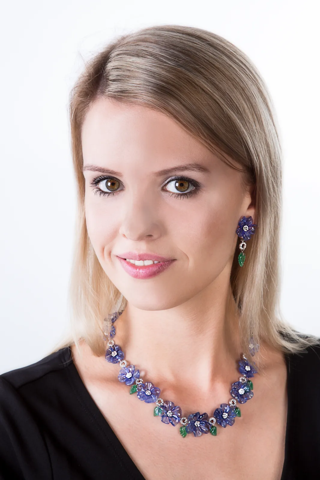 Tanzanite flowers and Emerald leaves as necklace and well as earrings