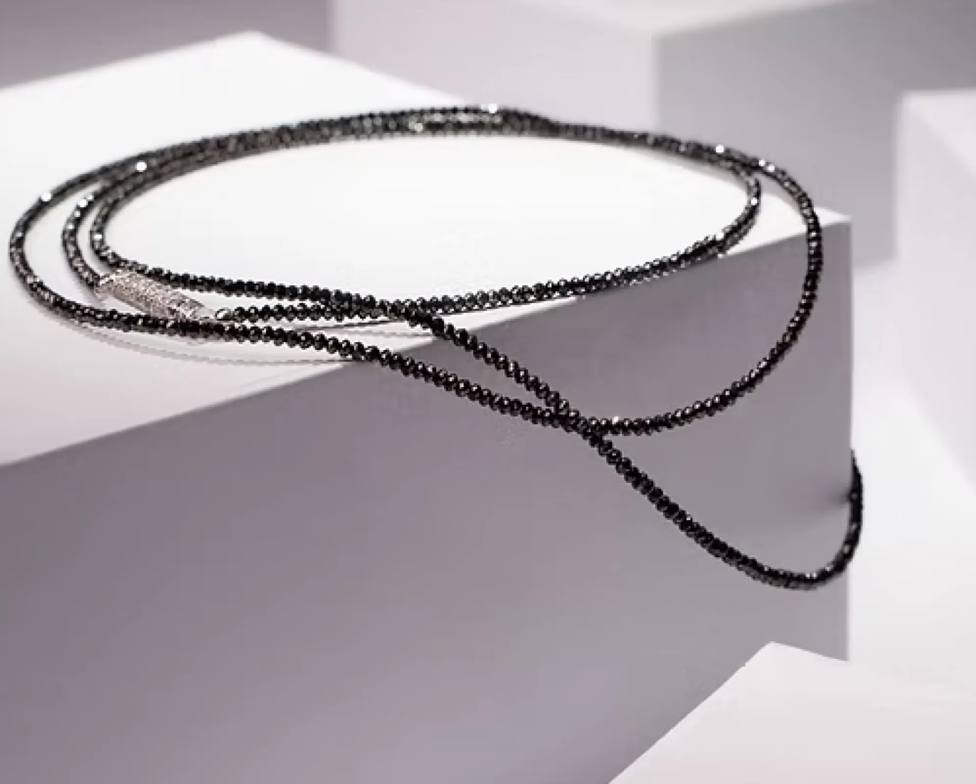 Diamond Beads black with Diamond clasp 750/-