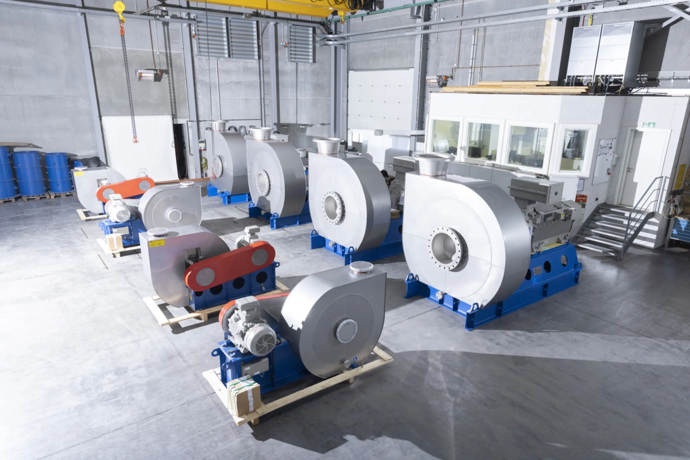 Eight FIMA blowers in the test bay are prepared for transport to the customer.