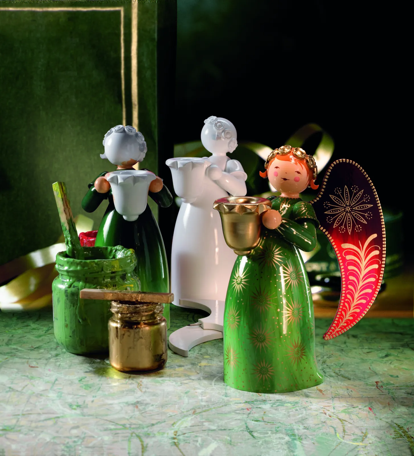 There are many steps involved in the process of making the richly painted angel shine.