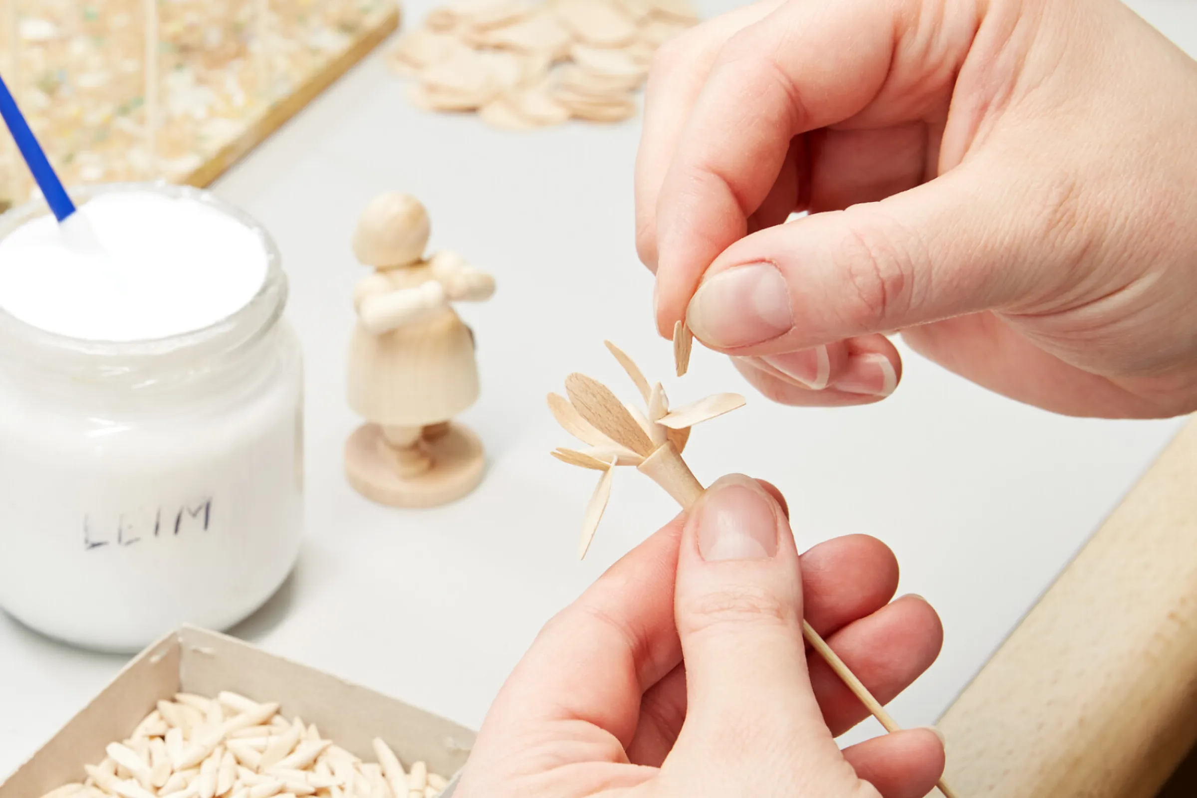 In the glue shop, the flower of an iris is glued together.