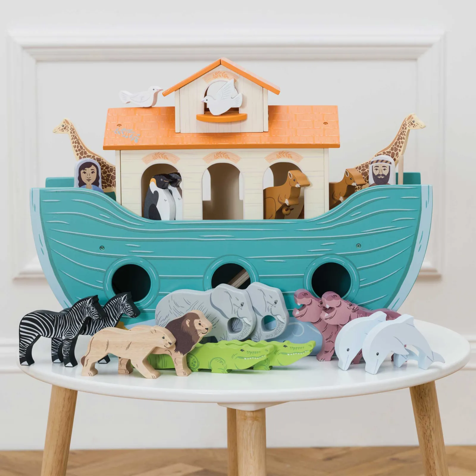 The animals went in 2 by 2. The classic toy: a big beautiful painted wooden ark with 10 pairs of hand-finished painted wooden animals plus Noah & his wife. A sliding panel in the hull & a hinged front hatch allow the animals to safely board the ark. W: 51cm D: 17cm H: 38cm W: 20.1 D: 6.7 H: 15 inches Self assembly 3+ YRS