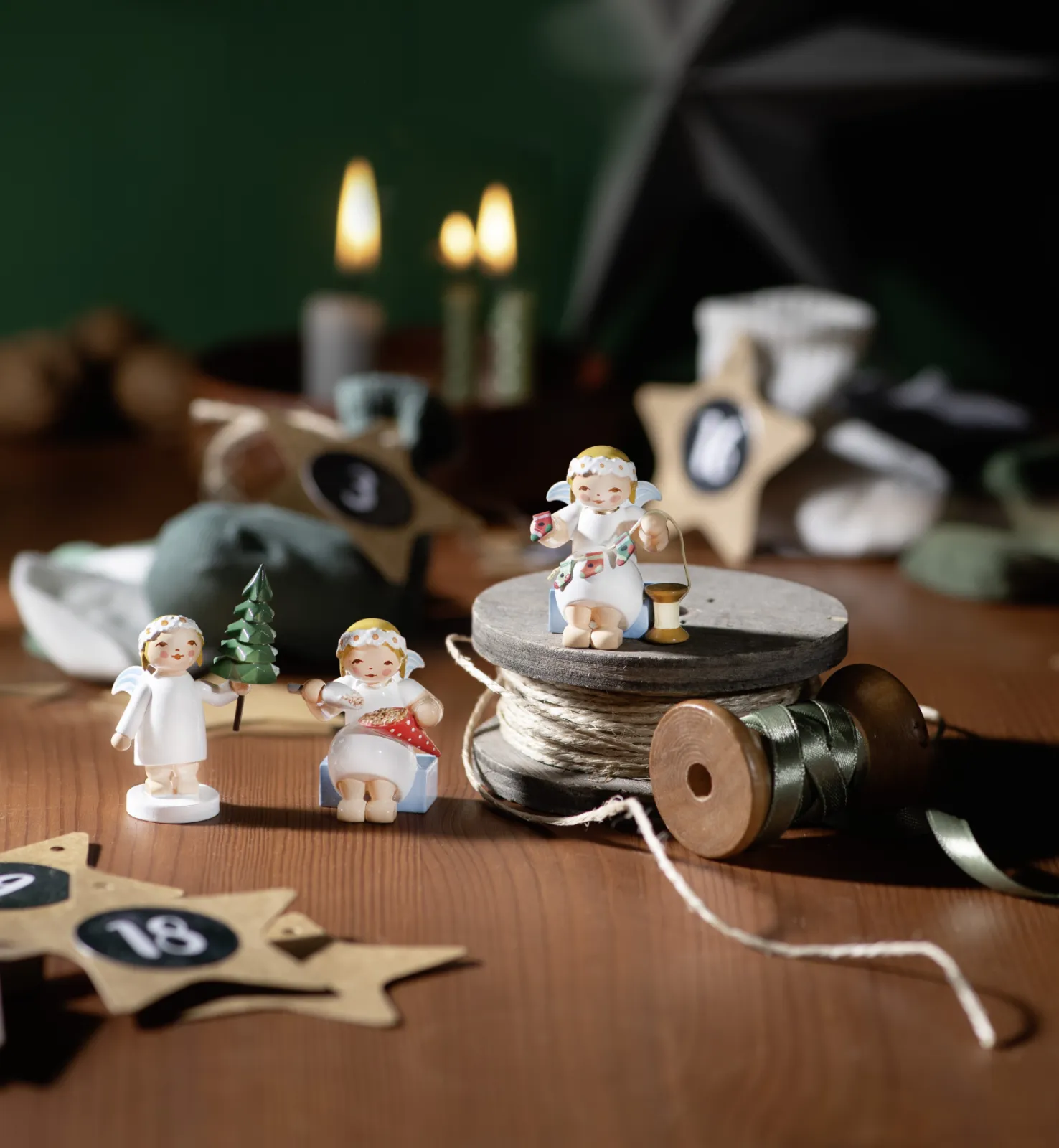 The marguerite angels assist in creating the traditional Advent calendar.