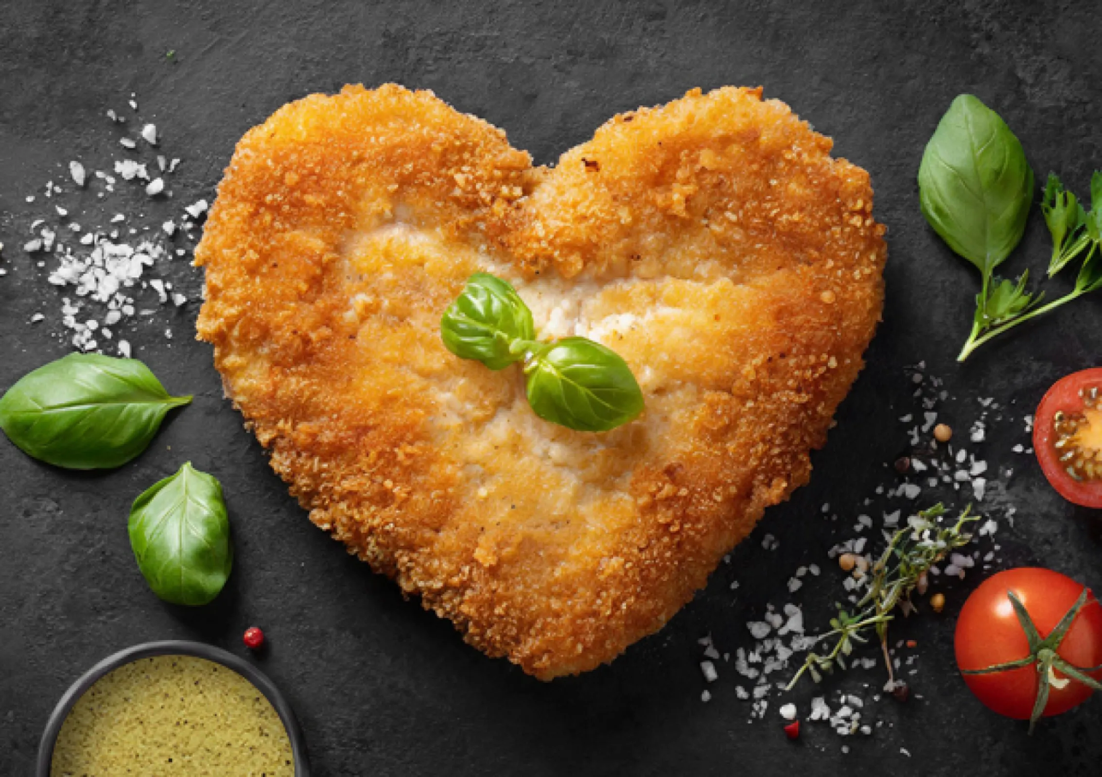 Schnitzel in the shape of a heart seasoned with Schnitzel Light AF Schnitzel in the shape of a heart seasoned with Schnitzel Light AF
