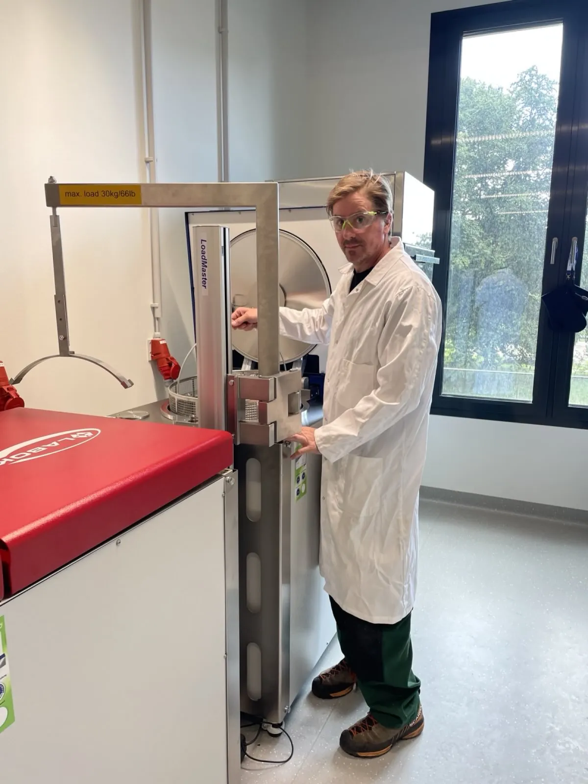 SLB team member servicing the biolab users.