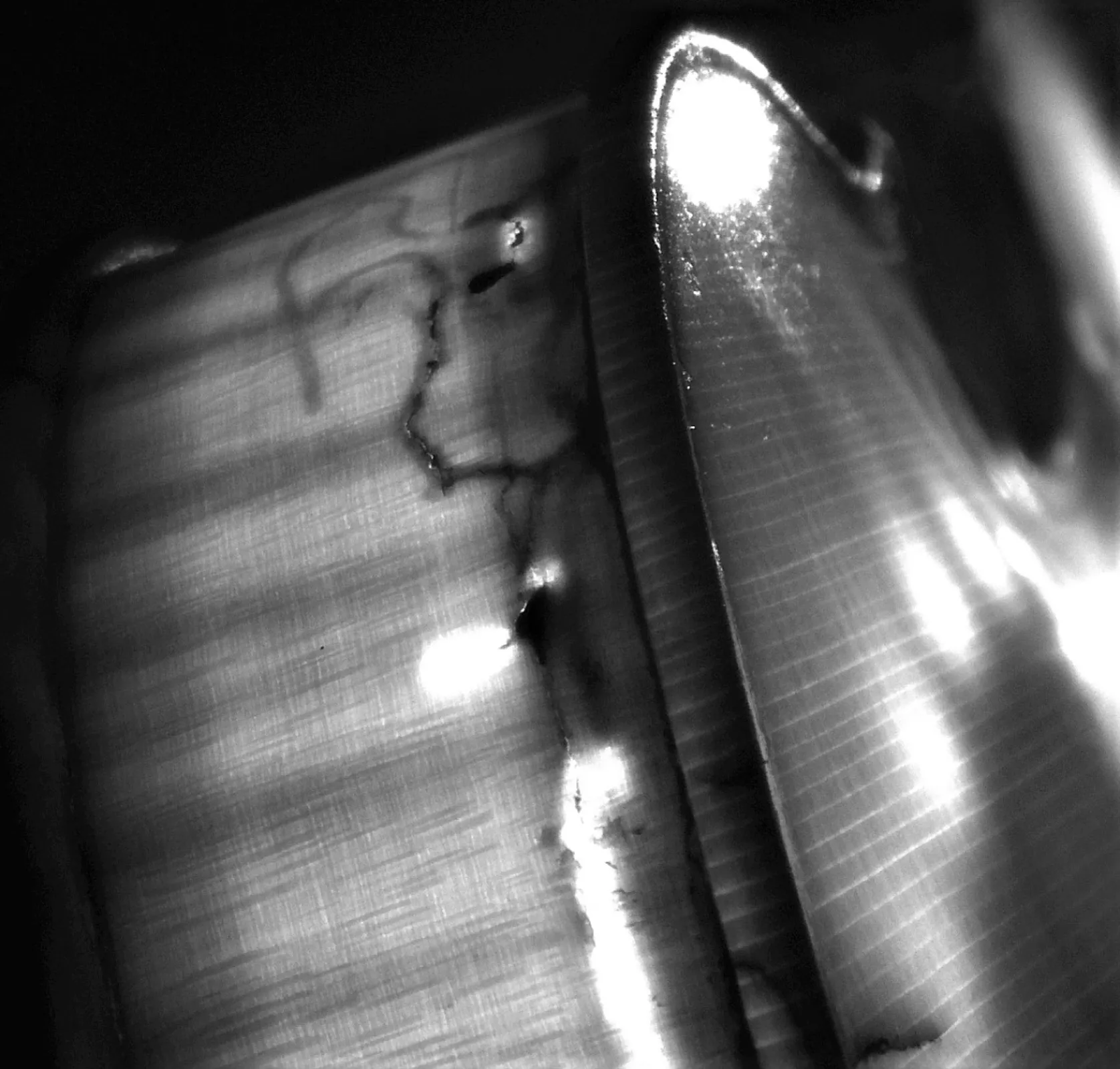 Infrared scanning and analysis of stringed