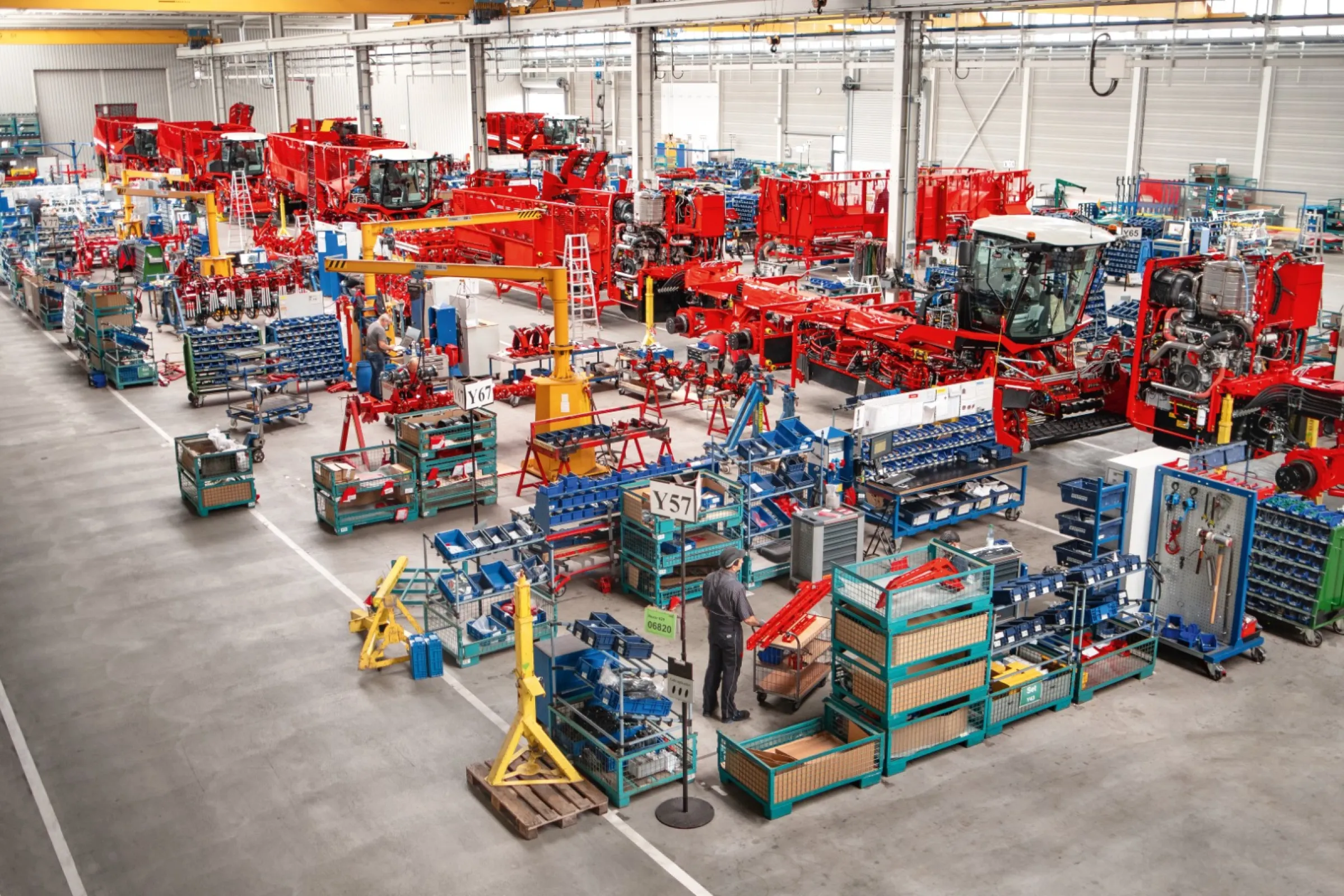 Assembly line self-propelled harvester