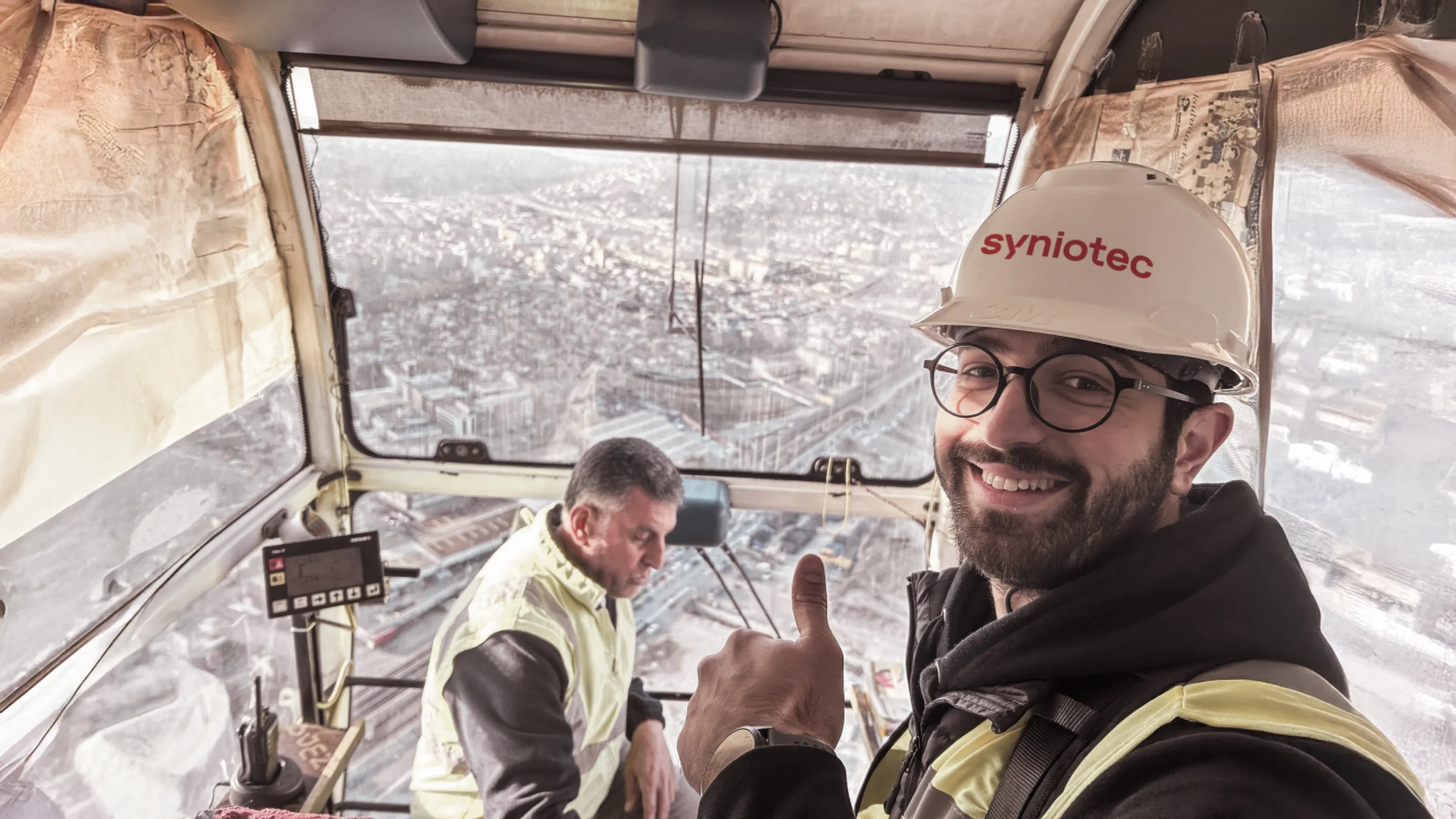 On-site use of syniotec solutions – taken inside a crane cabin during implementation support.