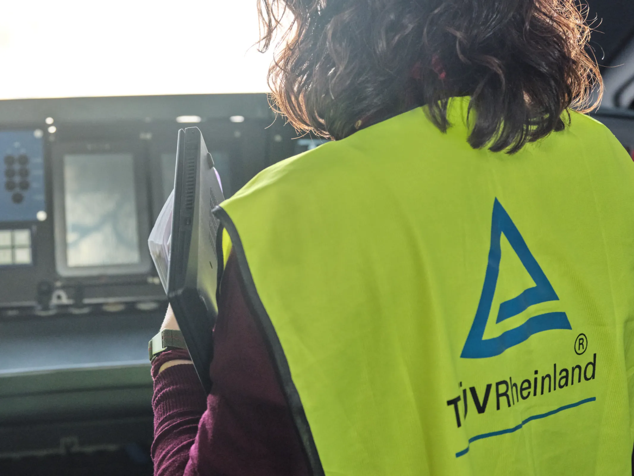 TÜV Rheinland colleagues on-site inspecting a rail system