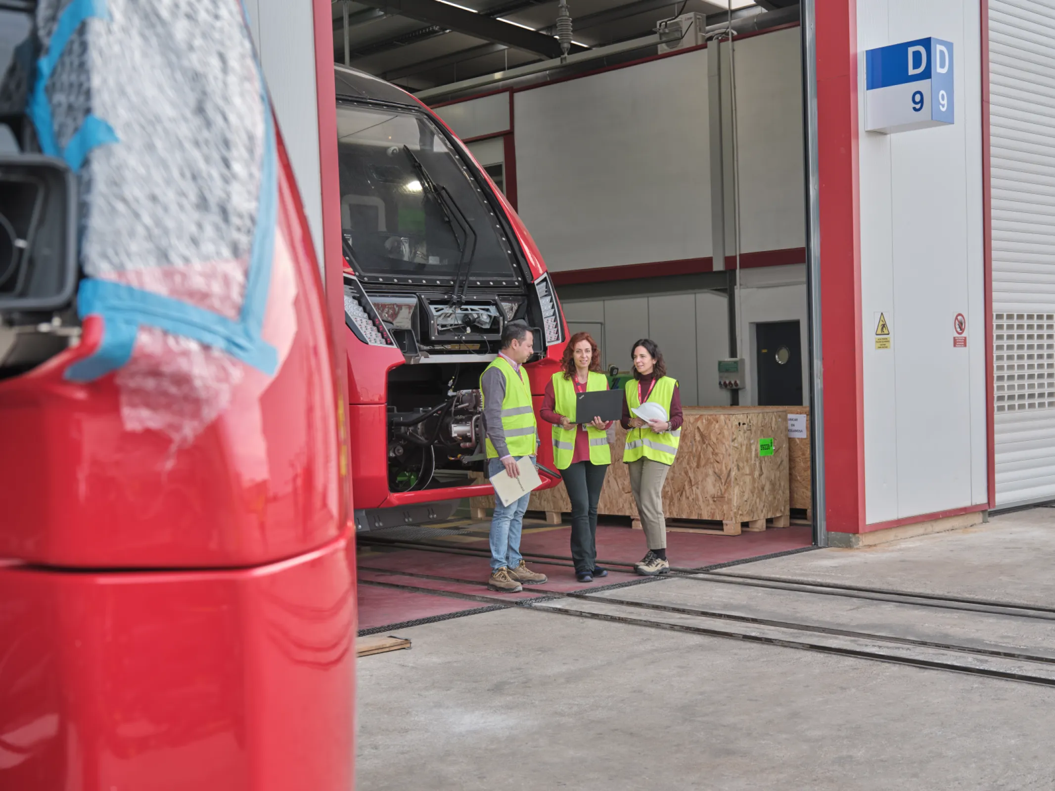 TÜV Rheinland colleagues on-site inspecting a rail system