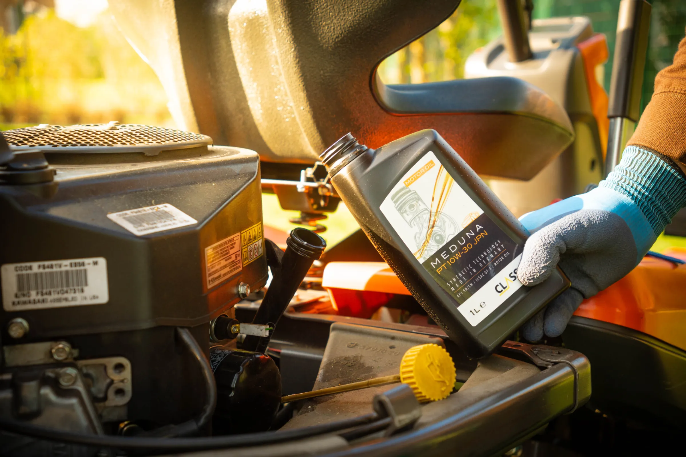 Topping up CLASSIC engine oil for optimal engine performance and protection.