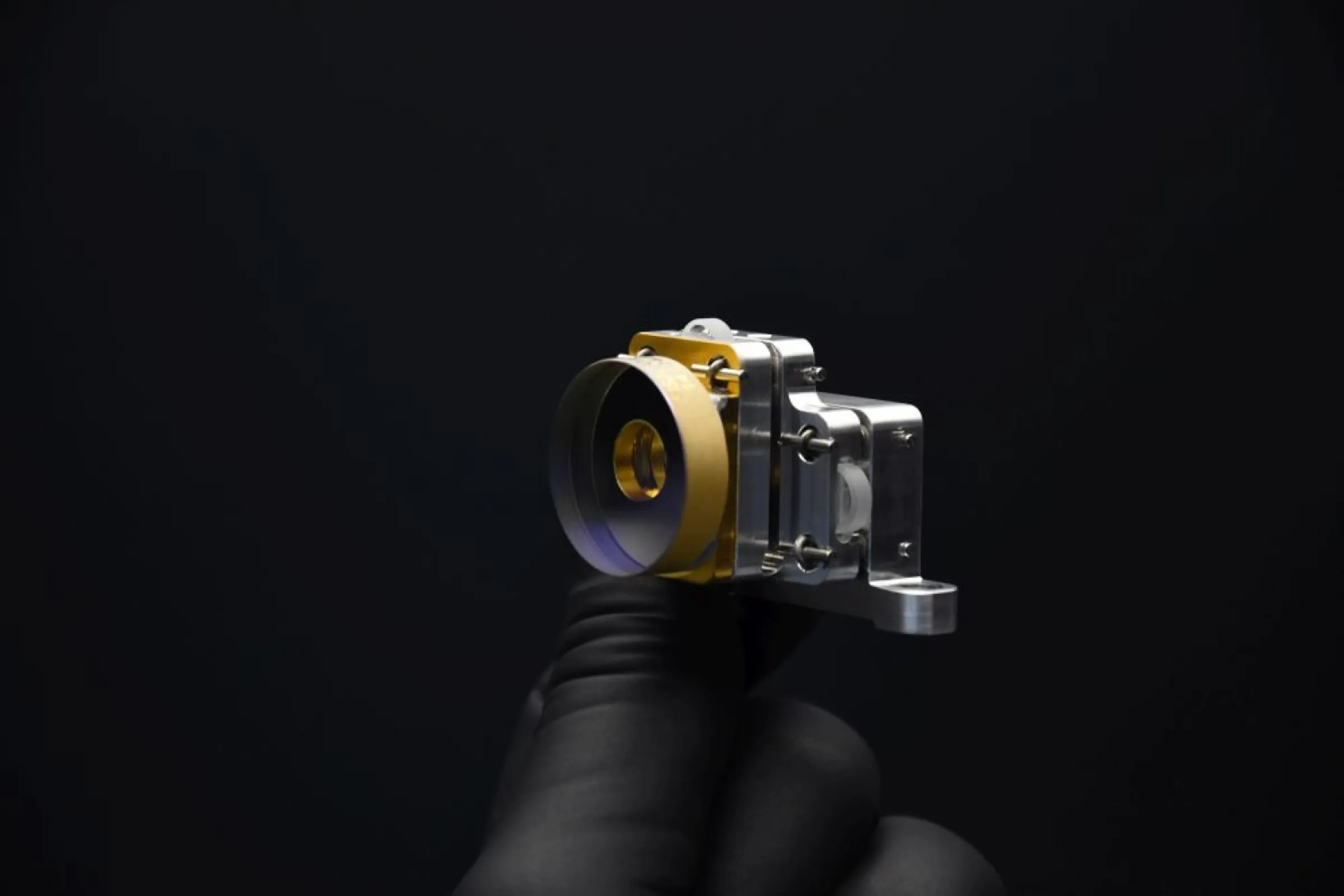 High precision mirror mount (optic soldered on CTE-matched submount soldered to flexure mount)