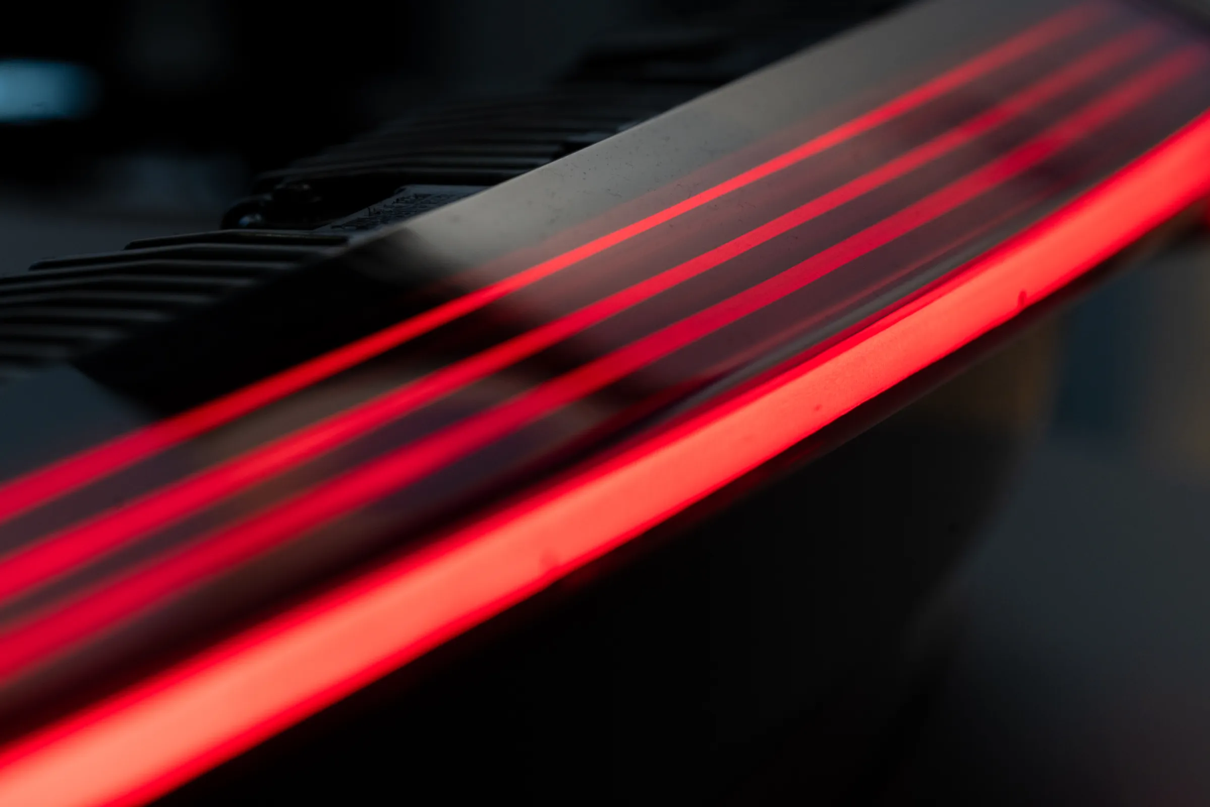 Neutral gray colors enable secret until lit effects for automotive rear lights.