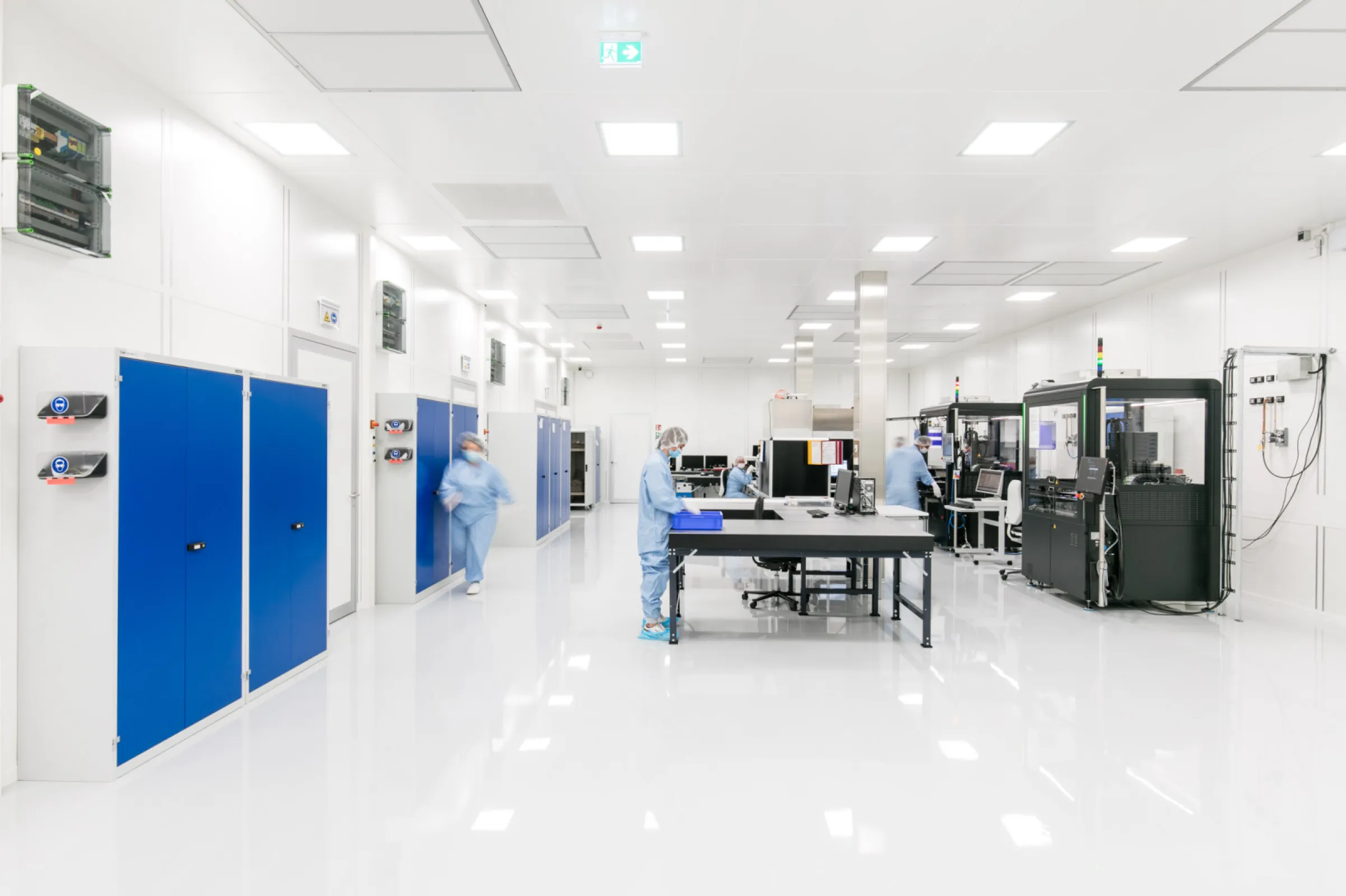 Lens attach machines in cleanroom