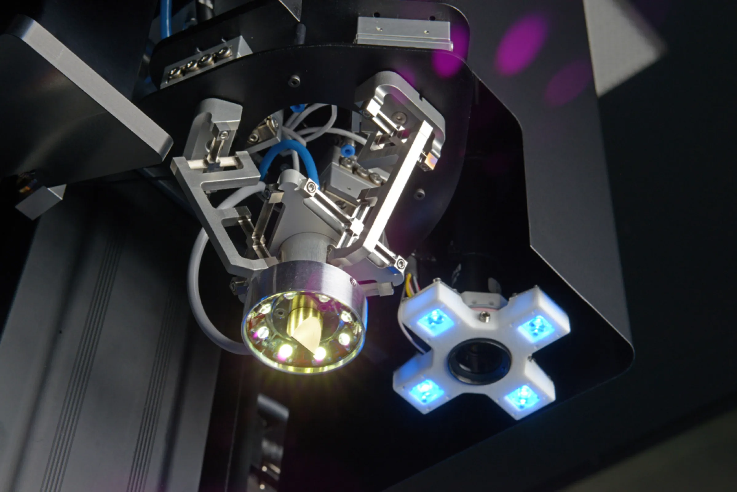 Exemplary toolhead configuration with 6DOF Hexapod with integrated UV-curing tool, Topside Camera and precision dispenser