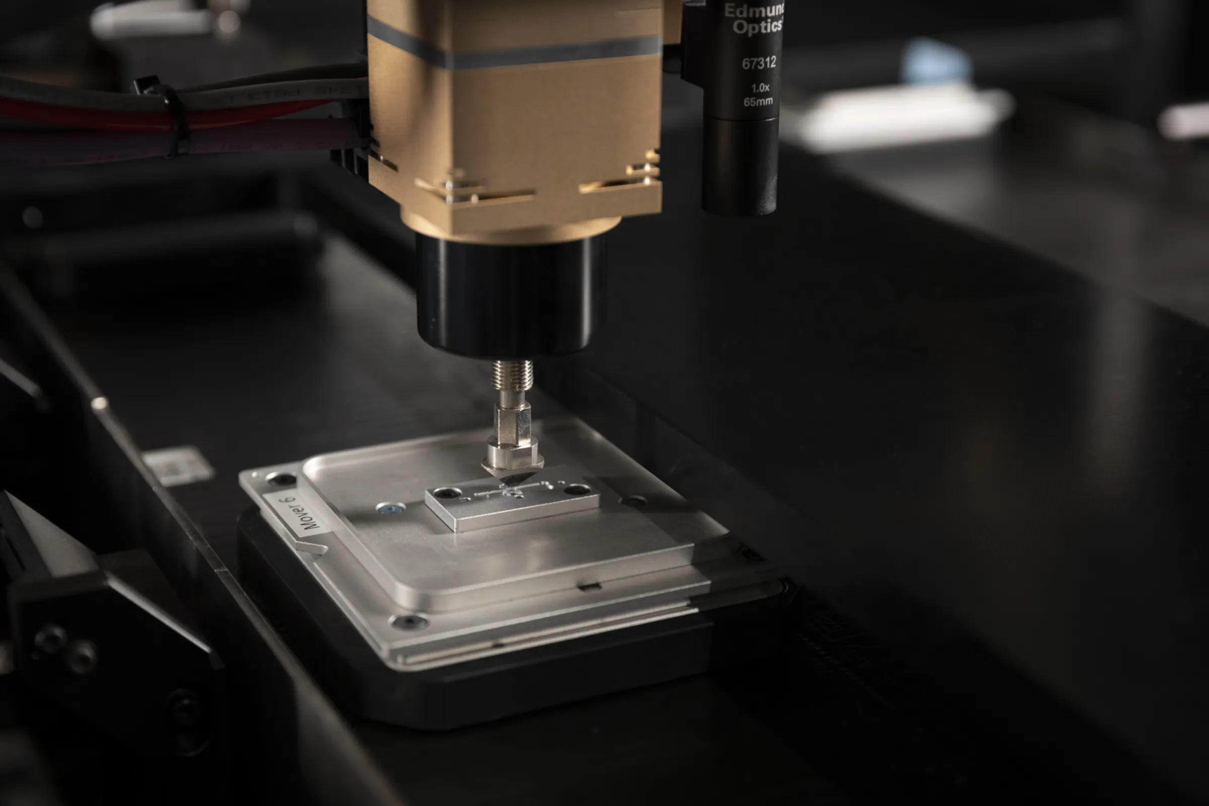 Vacuum Pickup tool pickung a tested Microlens for a magnetic levitation mover