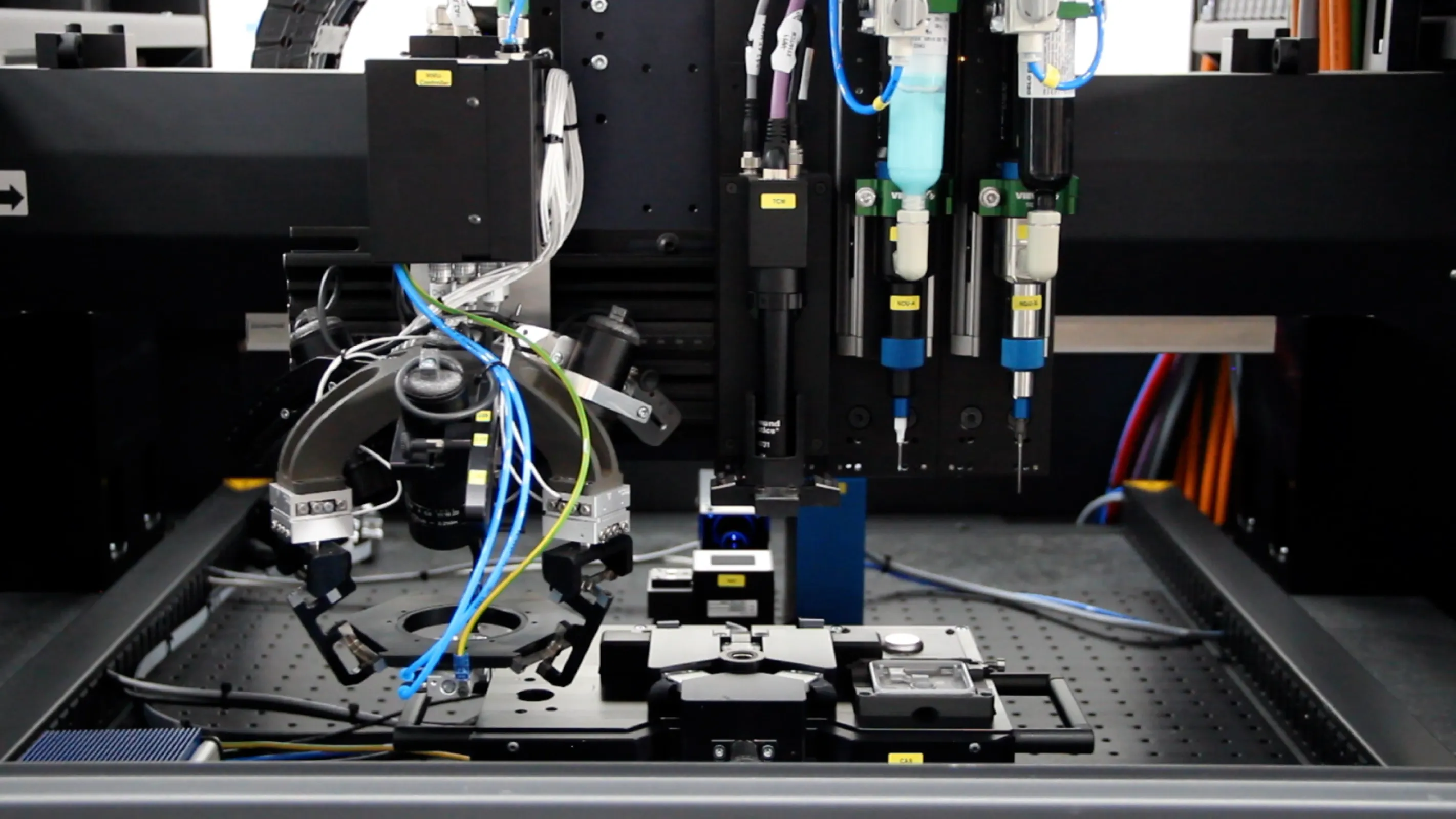 Camera Assembler Machine Configuration with Dual Dispensing System Camera Assembler Machine Configuration with Dual Dispensing System