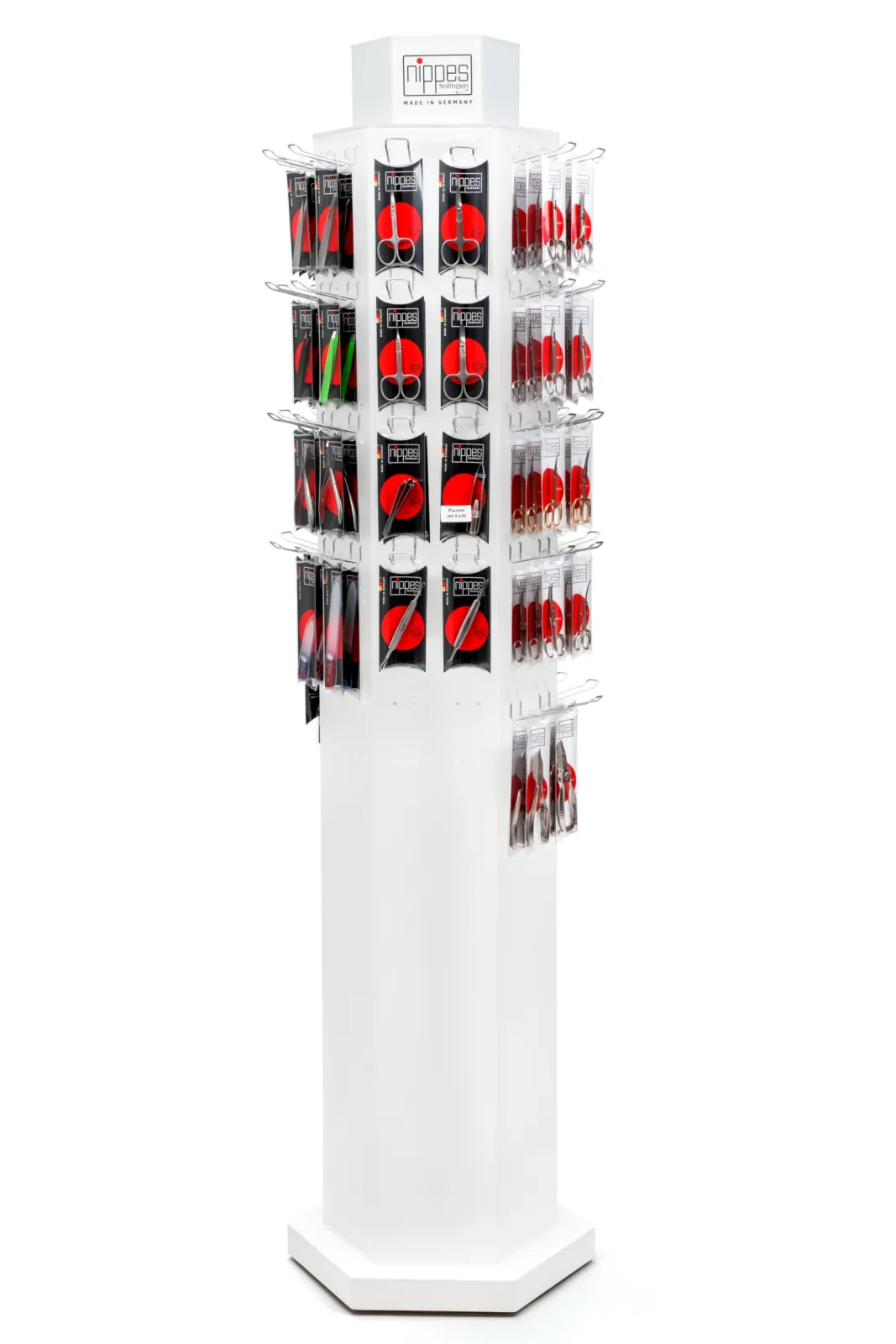 Rotating Floor-Display filled with 125 nickel-plated and stainless manicure-/pedicure-articles