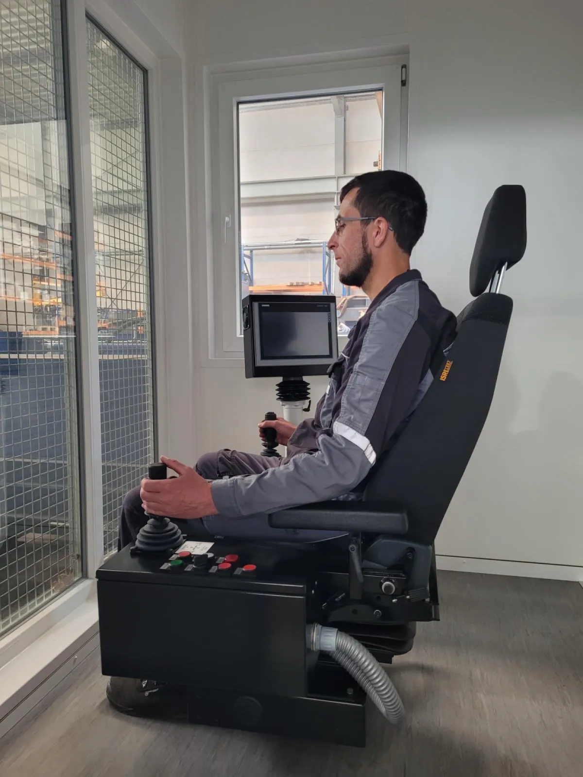 Operation seat in climatised control cabine for shear operation