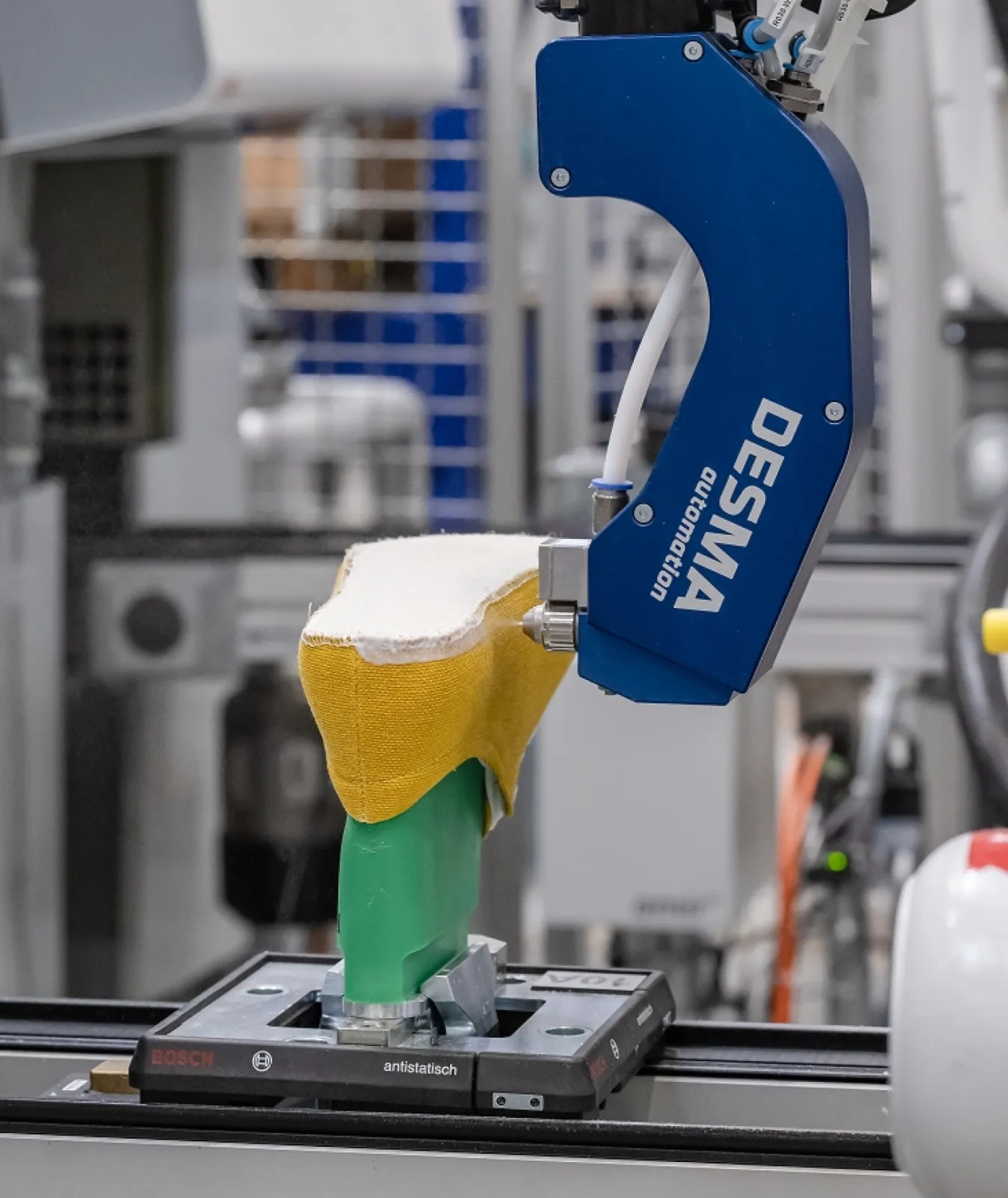 amir C spraying adhesive