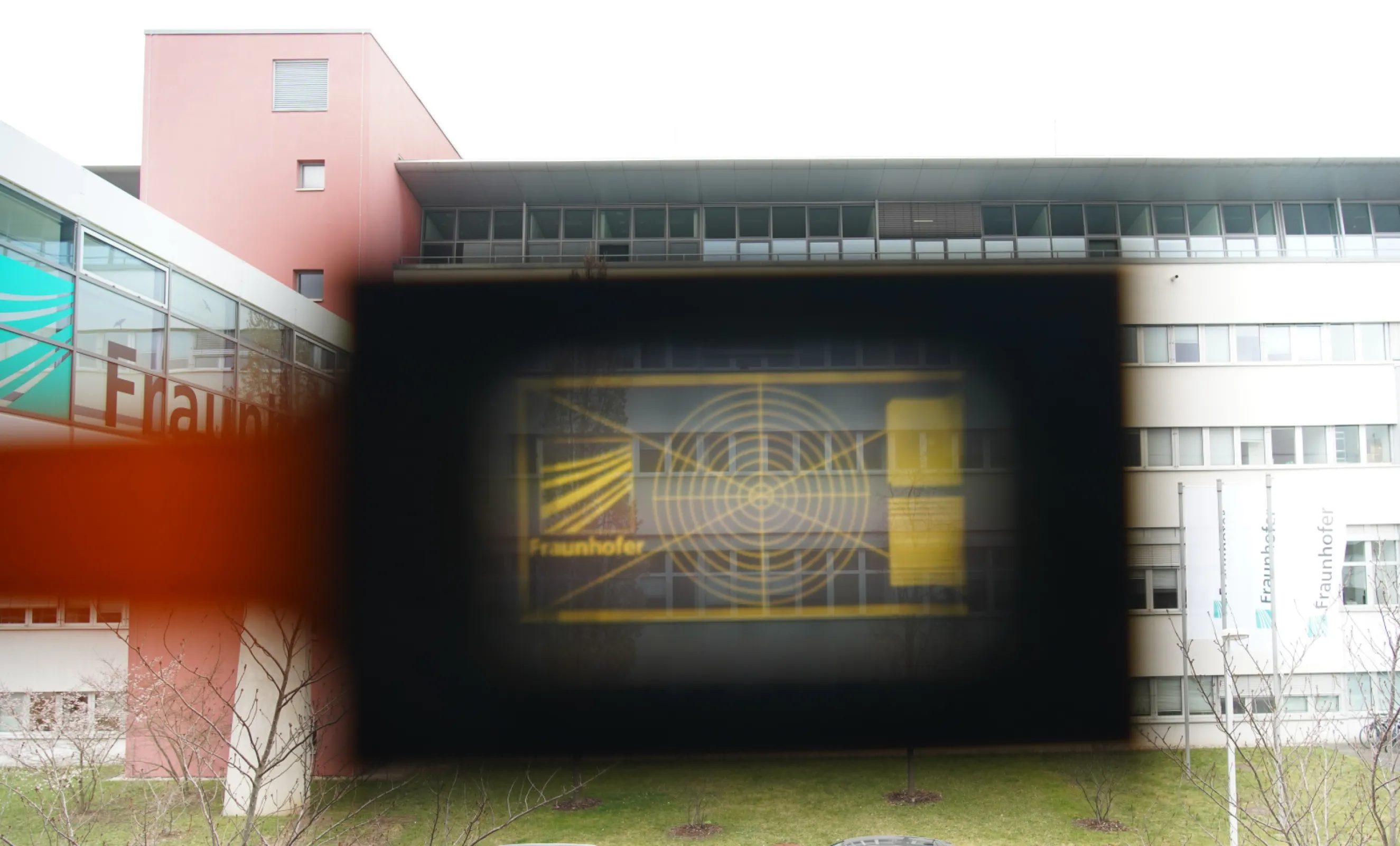 Semi-transparent emissive OLED microdisplay