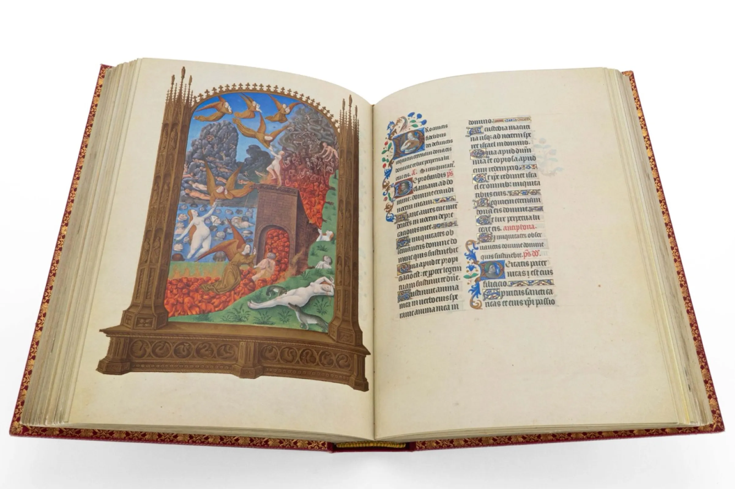 Fols. 113v-114r: The open book shows the illustration of Purgatory. This miniature, along with the accompanying decorated initials, was painted by Jean Colombe around 1485. The scene depicts souls undergoing purification, surrounded by flames and dramatic imagery, reflecting late medieval beliefs about the afterlife and the moral order, executed with Colombe’s detailed and expressive style.