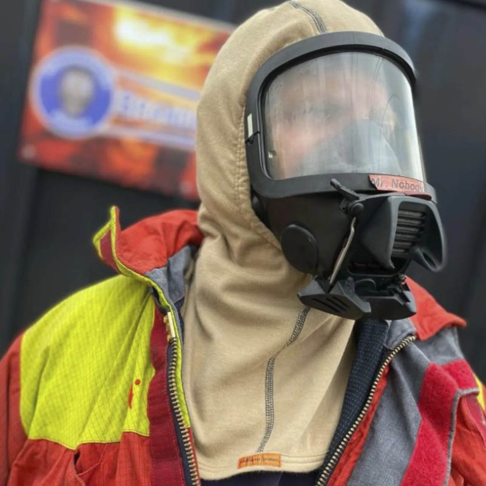 Flame retardant hood with membrane