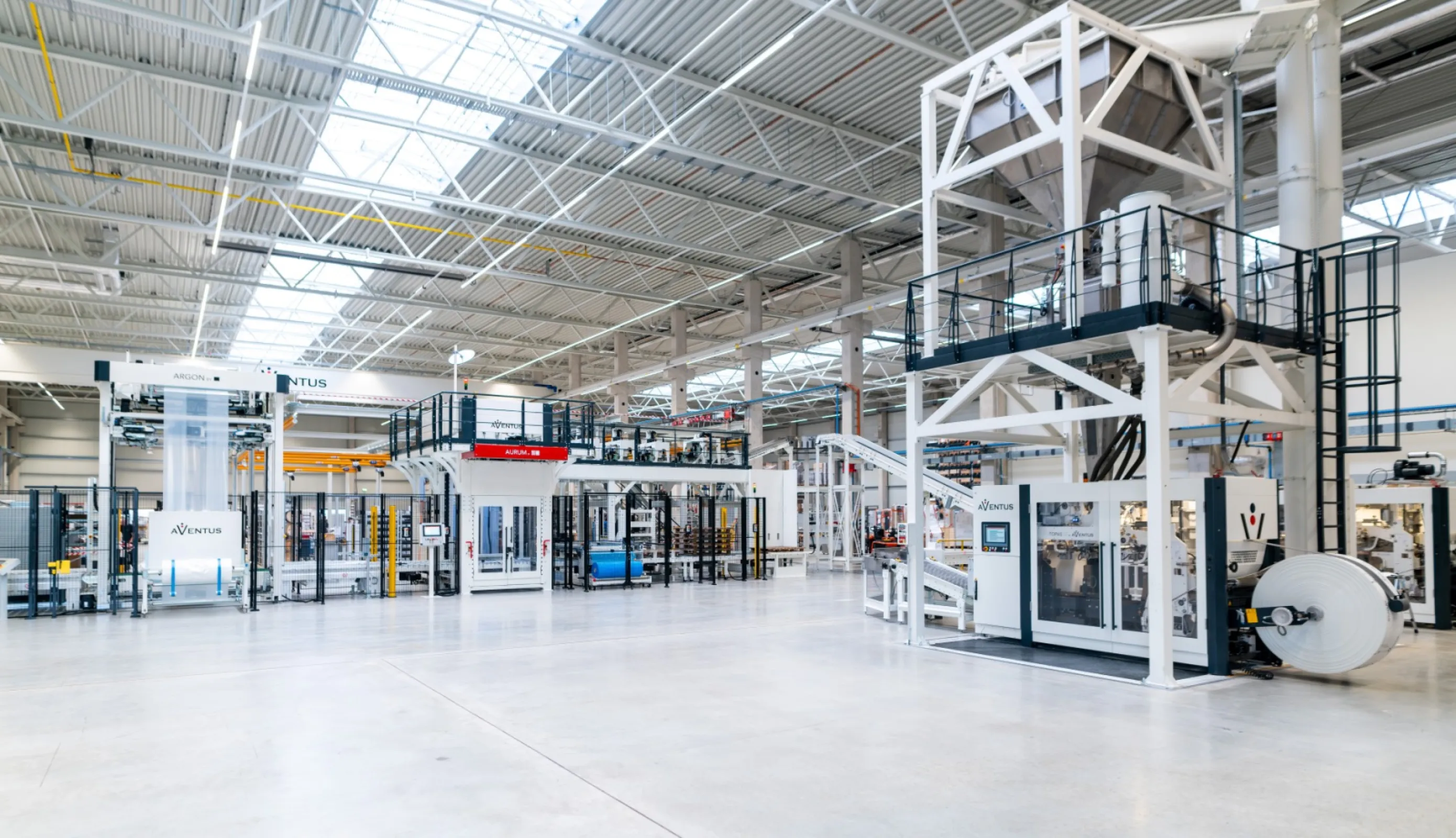 AVENTUS packaging line for filling granules into FFS bags with FFS machine TOPAS SF, AURUM palletizer and ARGON stretchhood