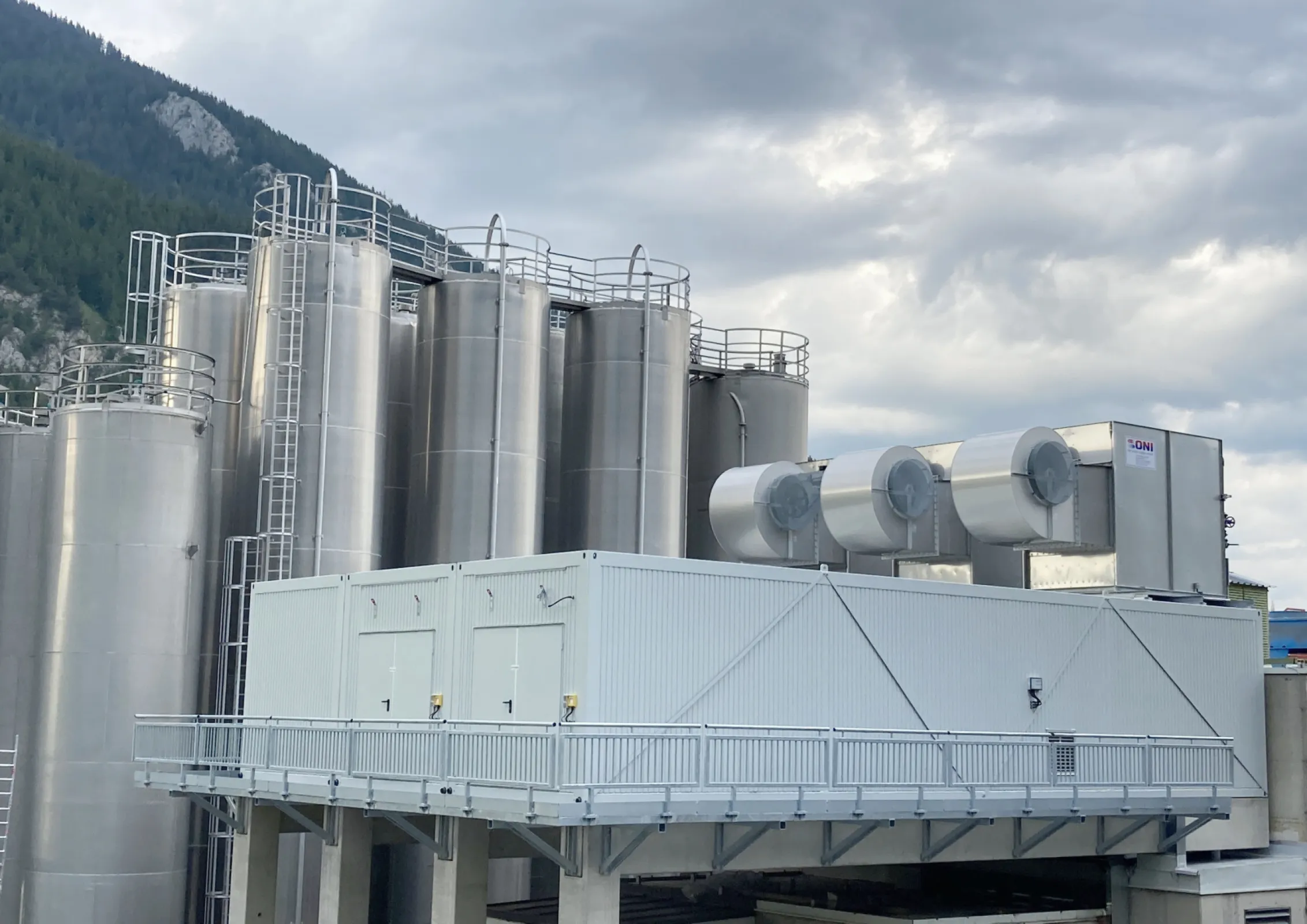 Highly efficient modular cooling water energy center with heat recovery and industrial heat pump