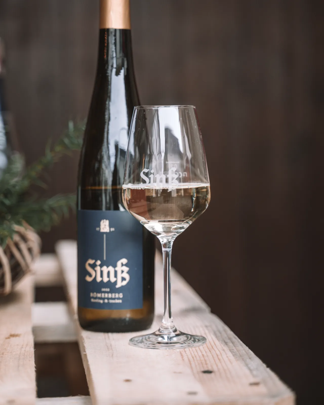 Riesling glass and bottle