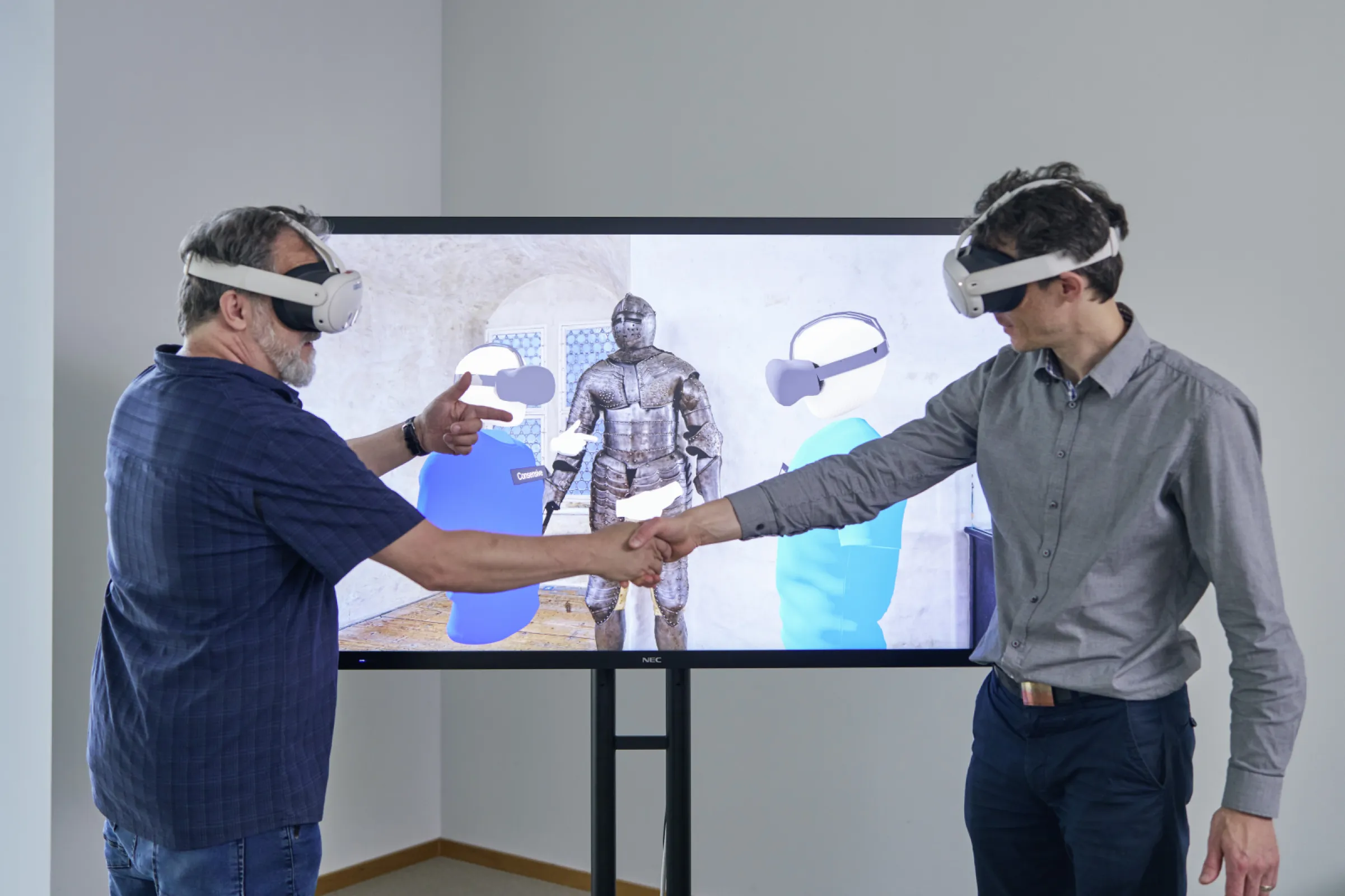 The Converseum is a low-cost, high-performance collocated mixed-reality setup.