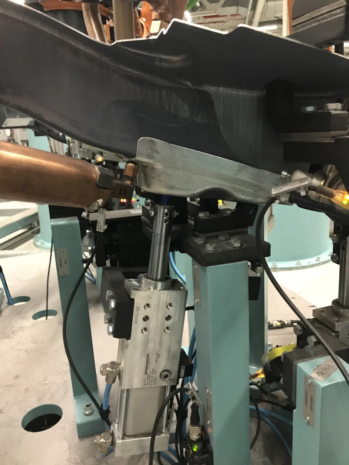 SZK 63 Tuenkers retractable locating pin in a BIW fixture