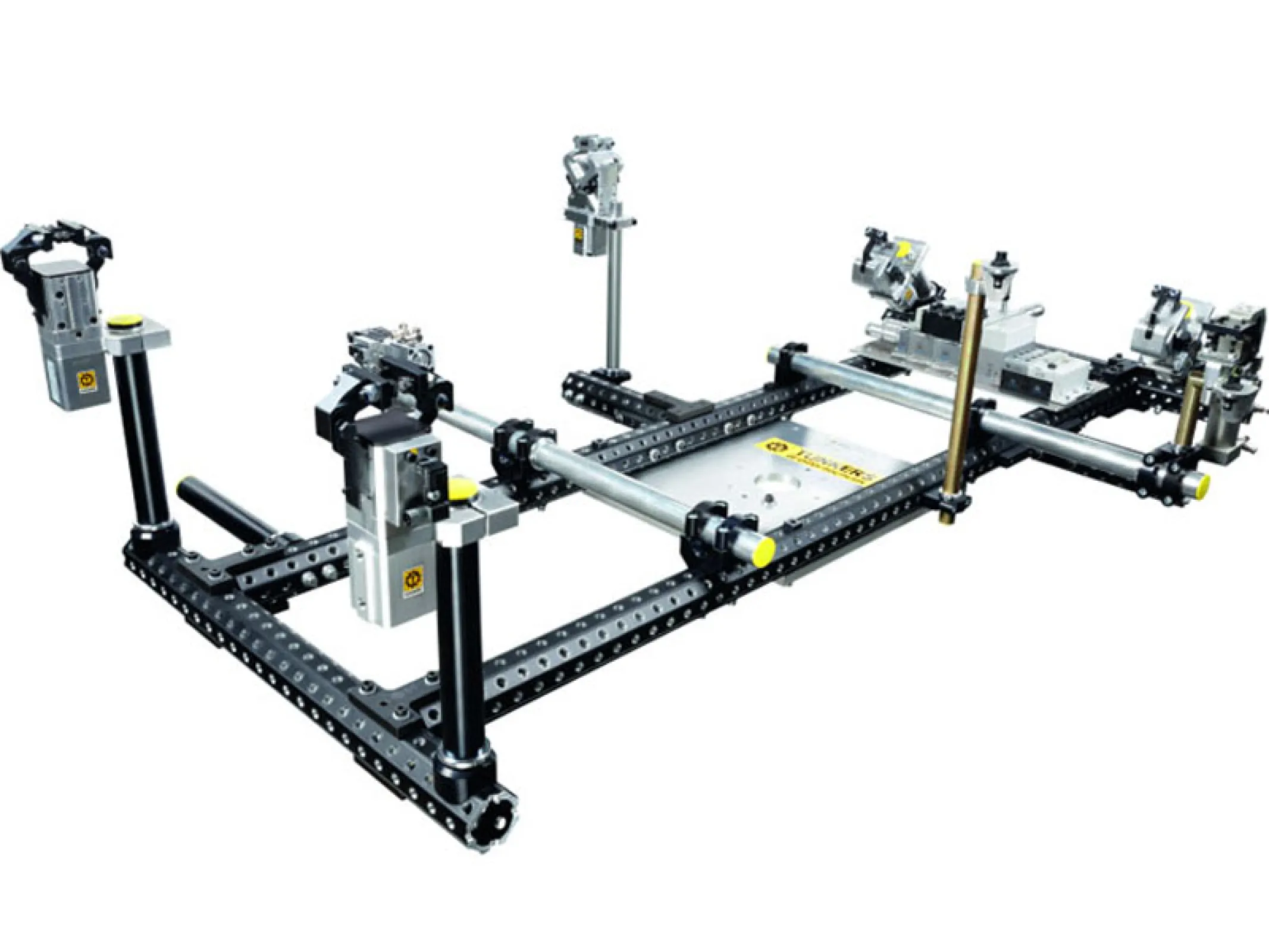 The TOS gripper system (Tünkers One Screw) is a modular gripper system. The main frame of this system is based on an octagonal profile with alternated bore hole pattern. The joints are form-closed fixed to the main frame profile.