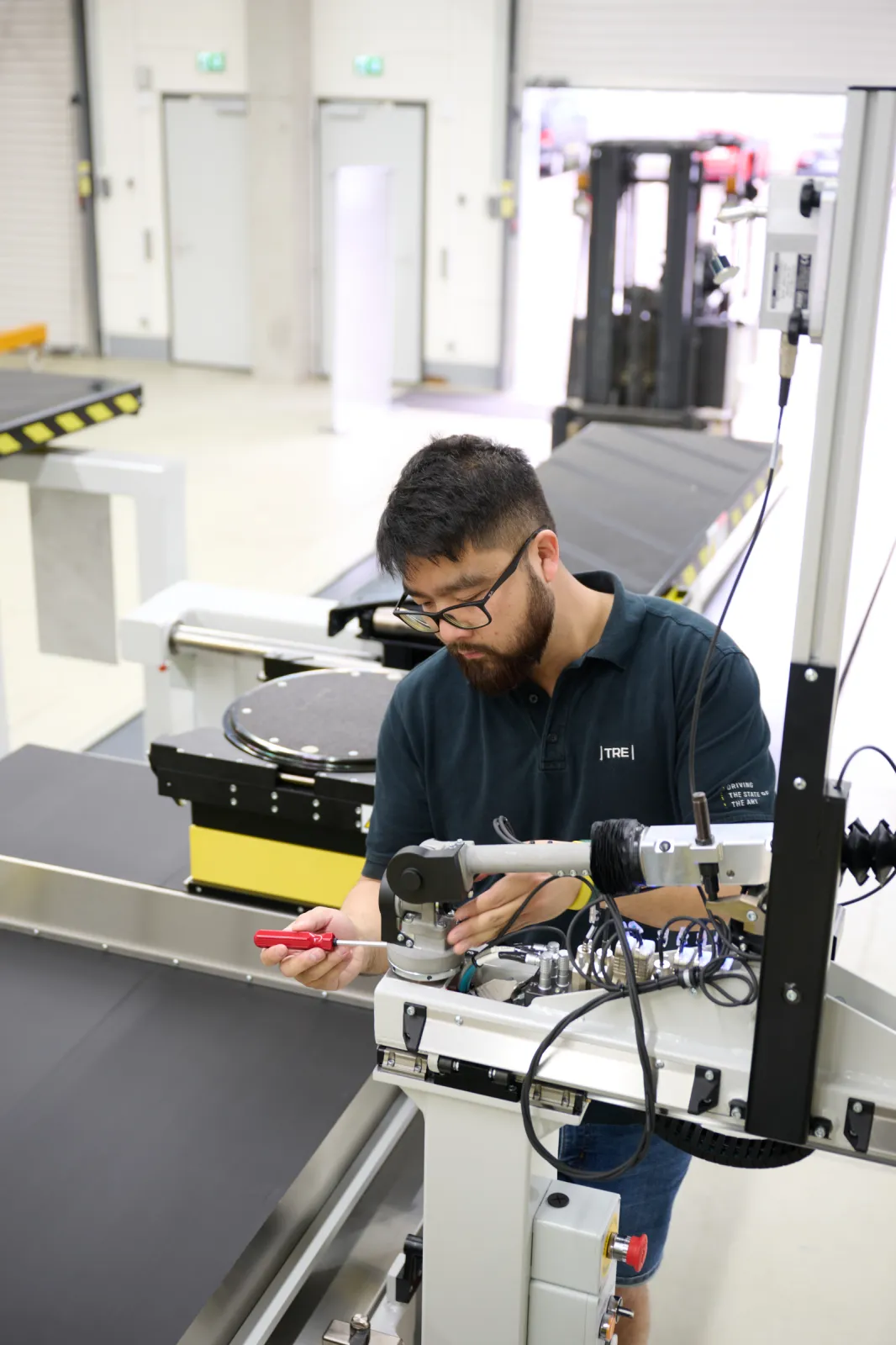 TRE engineer prepares wheel arm sensor