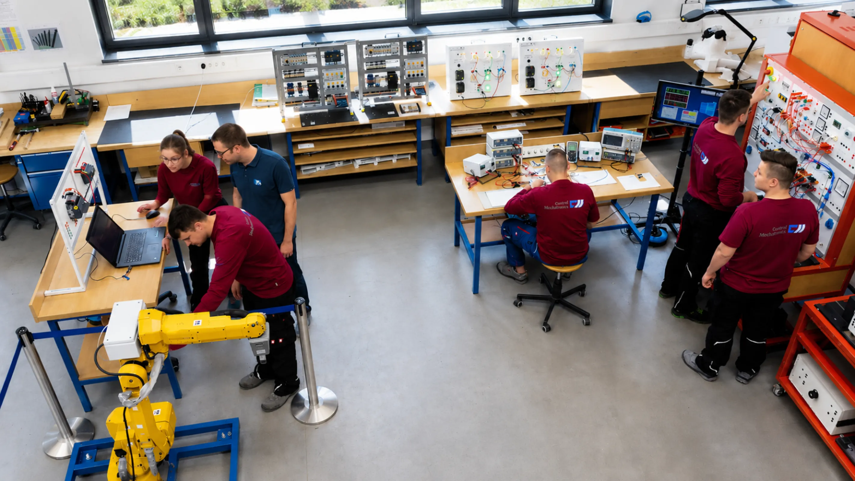 Training workshop educating future specialists in electrical engineering and automation, ensuring long-term expertise and support for complex project execution.