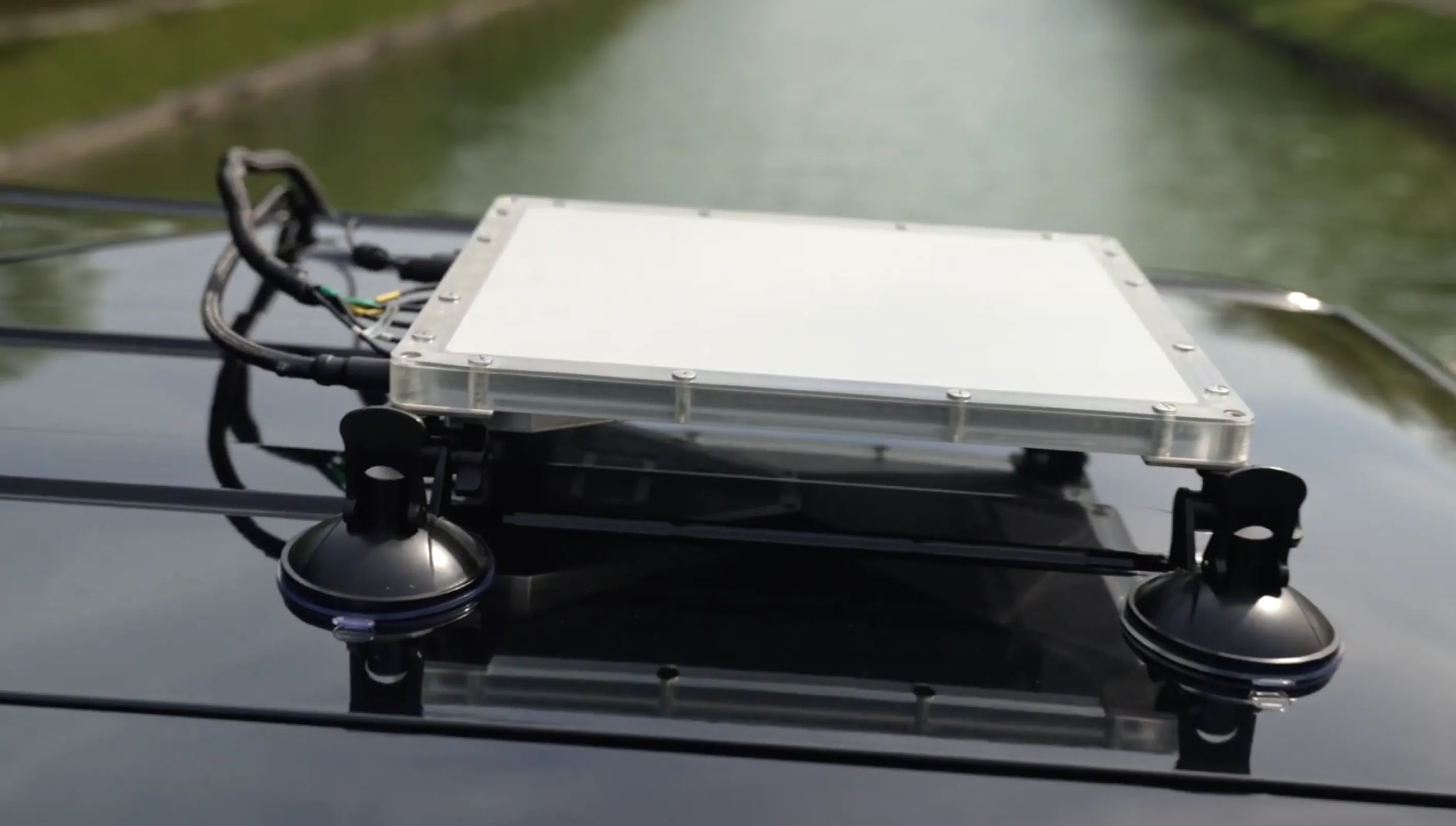 OIQ MOVE deployed on a passenger car