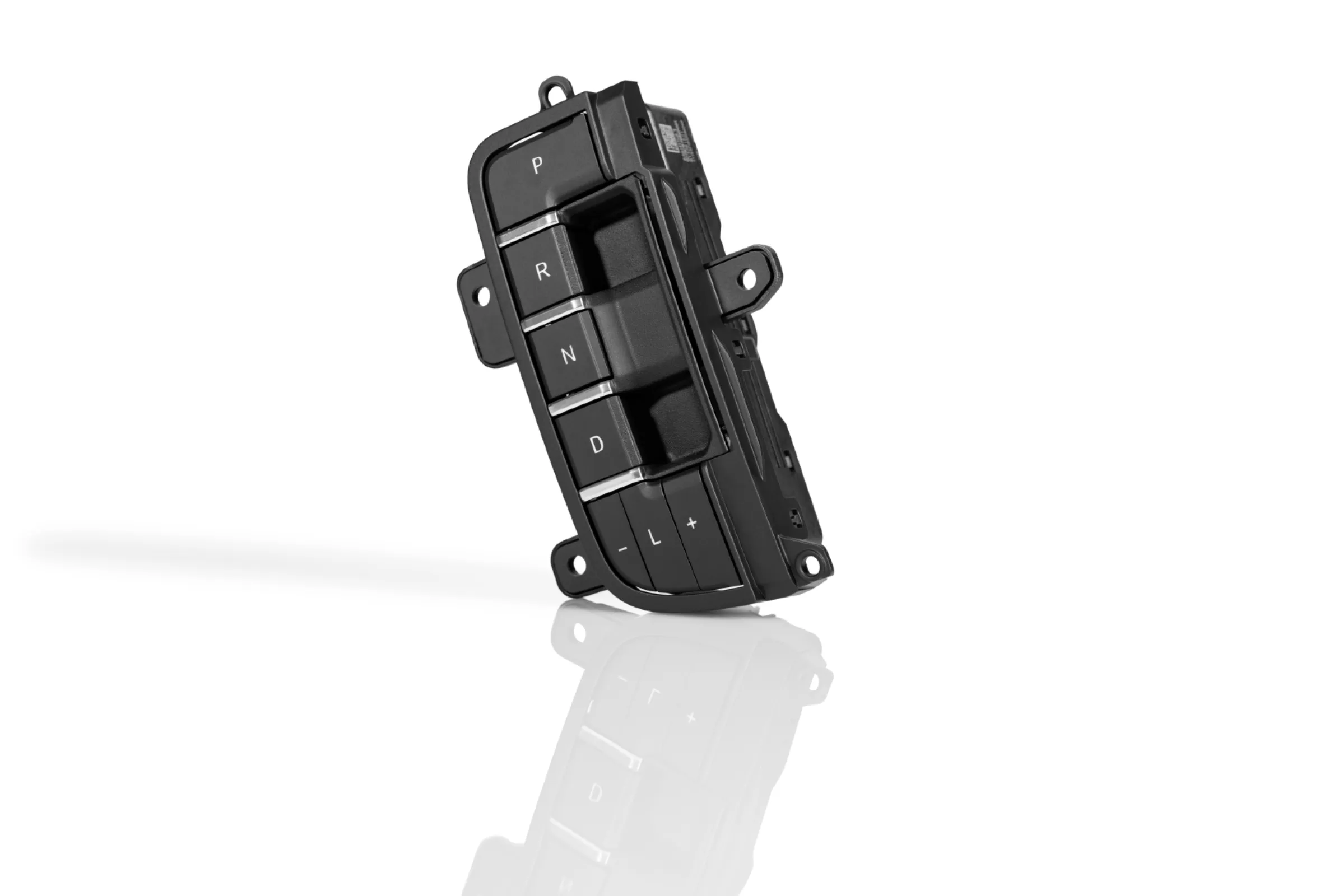 Shift-by-Wire Transmission Control: double shot molded components with TPV, assembly of painted buttons and chrome ribs via heat staking